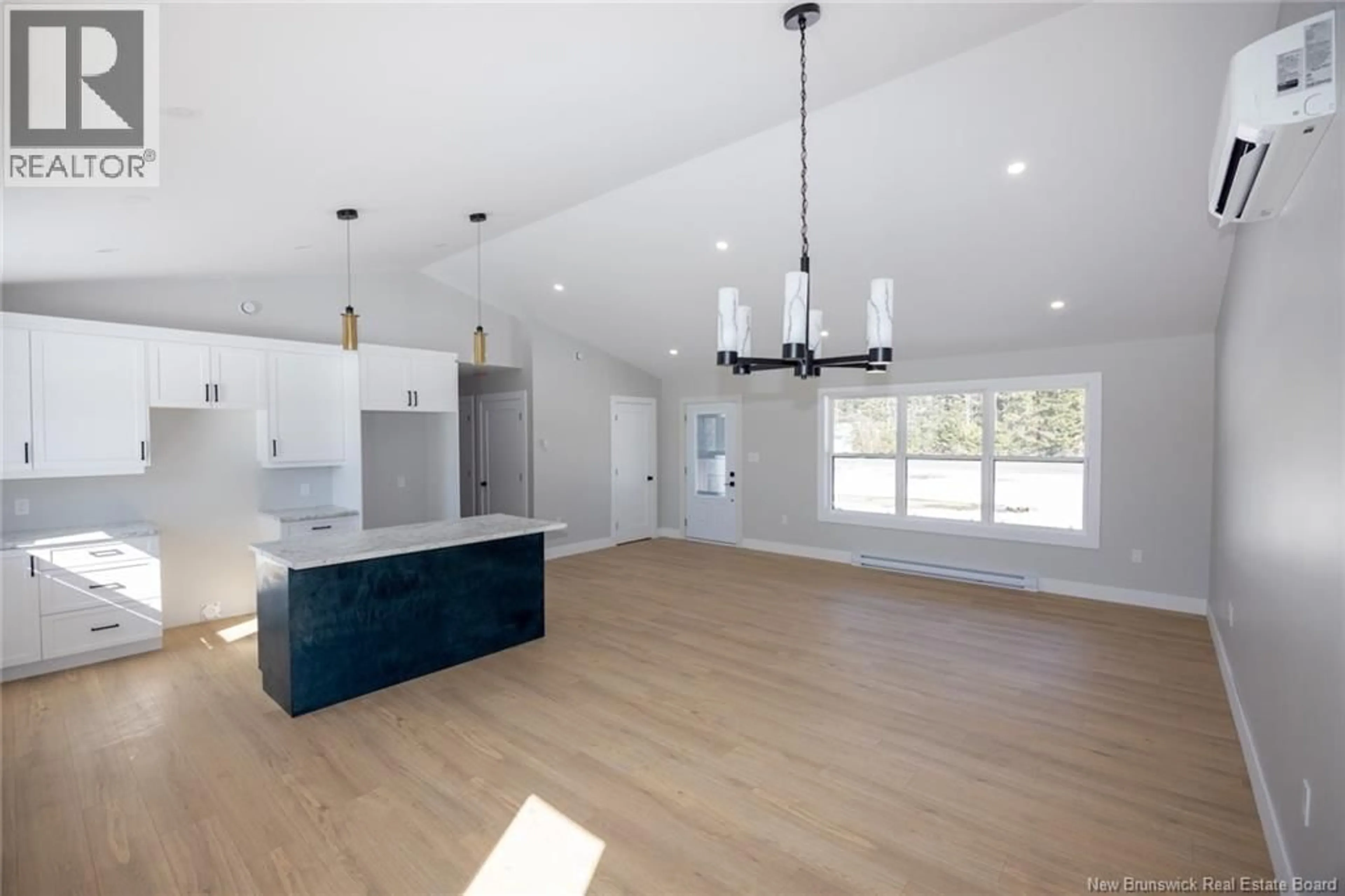 Open concept kitchen, wood/laminate floor for 496 ENGLISH SETTLEMENT ROAD, English Settlement New Brunswick E6B2G1