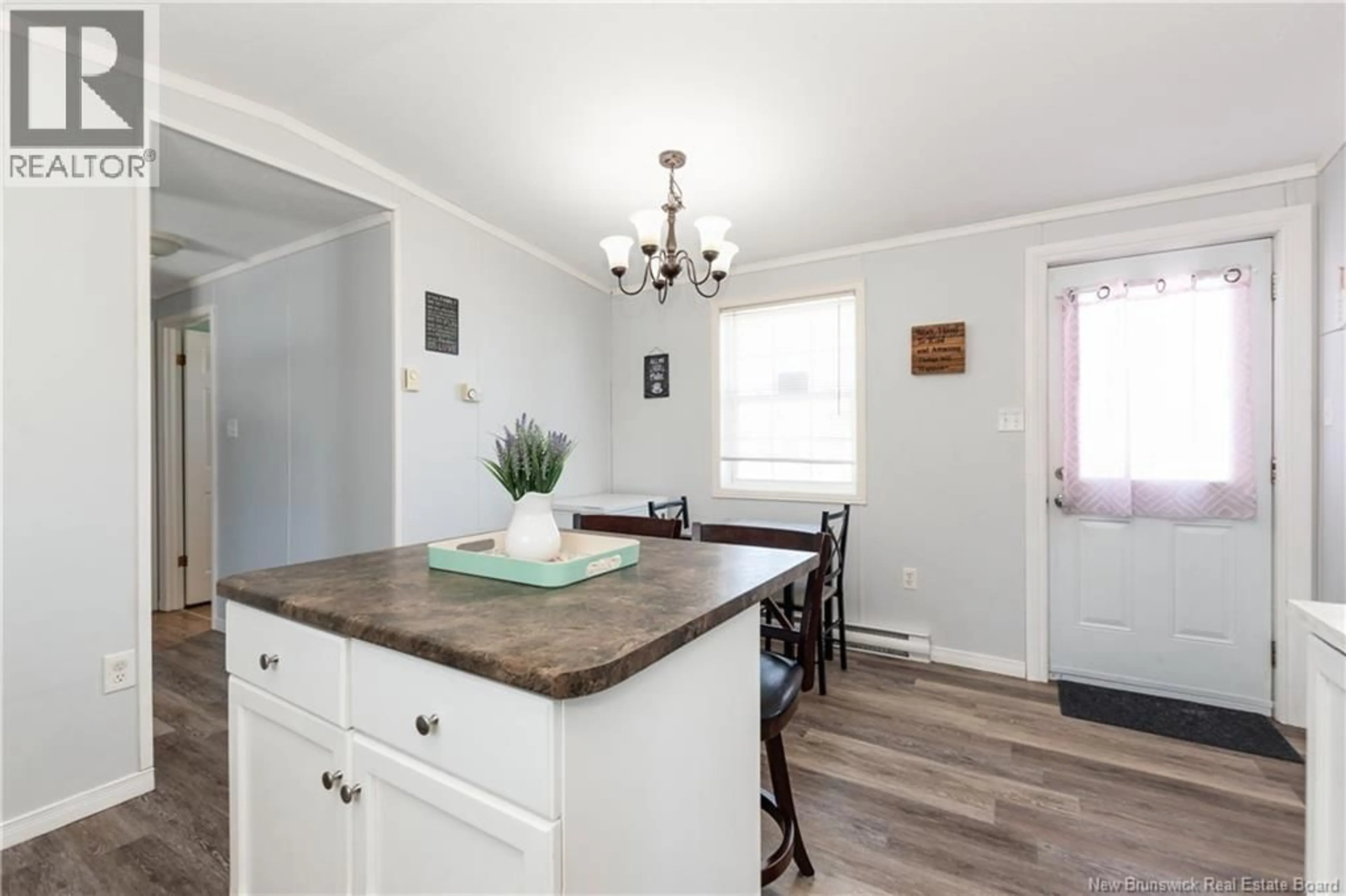 Open concept kitchen, wood/laminate floor for 68 HAYWARD LANE, Riverview New Brunswick E1B5R2