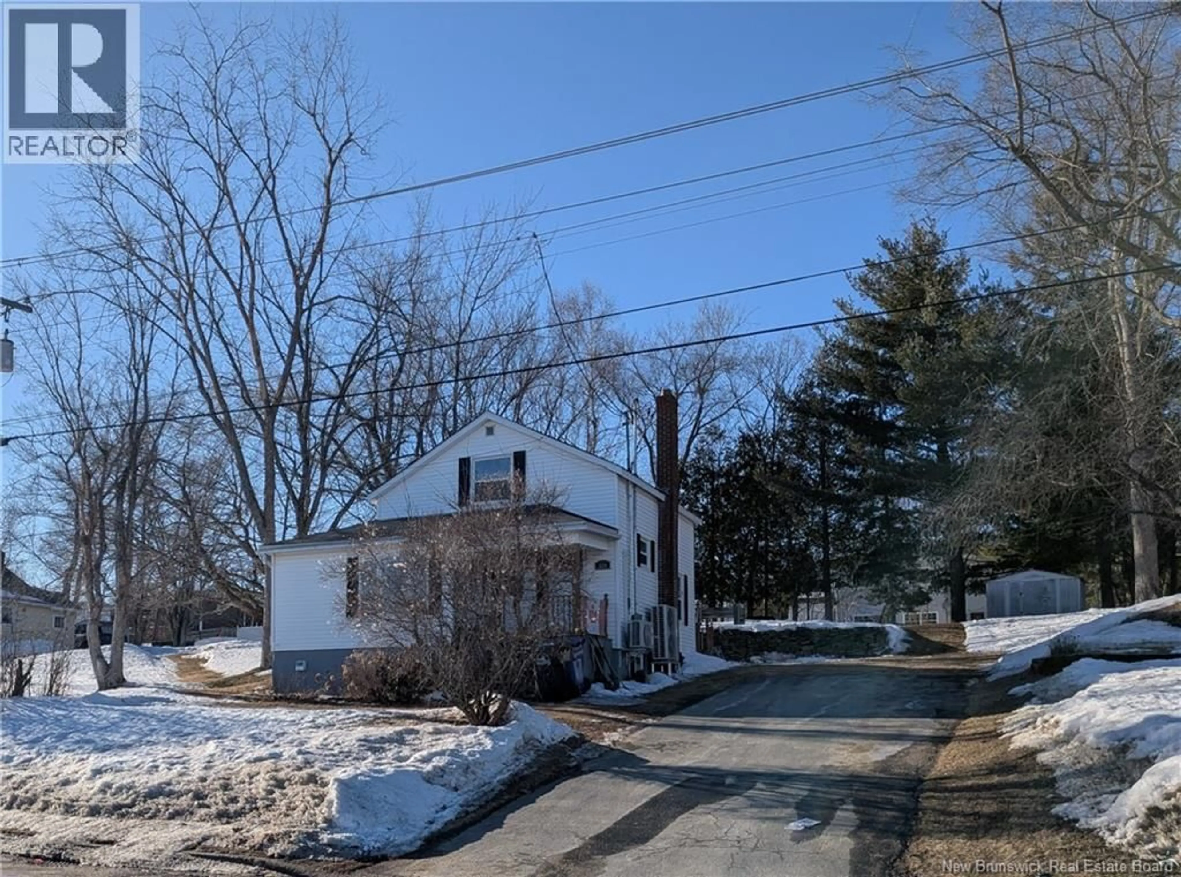 A pic from outside/outdoor area/front of a property/back of a property/a pic from drone, street for 235 GLADSTONE AVENUE, Miramichi New Brunswick E1V1E7