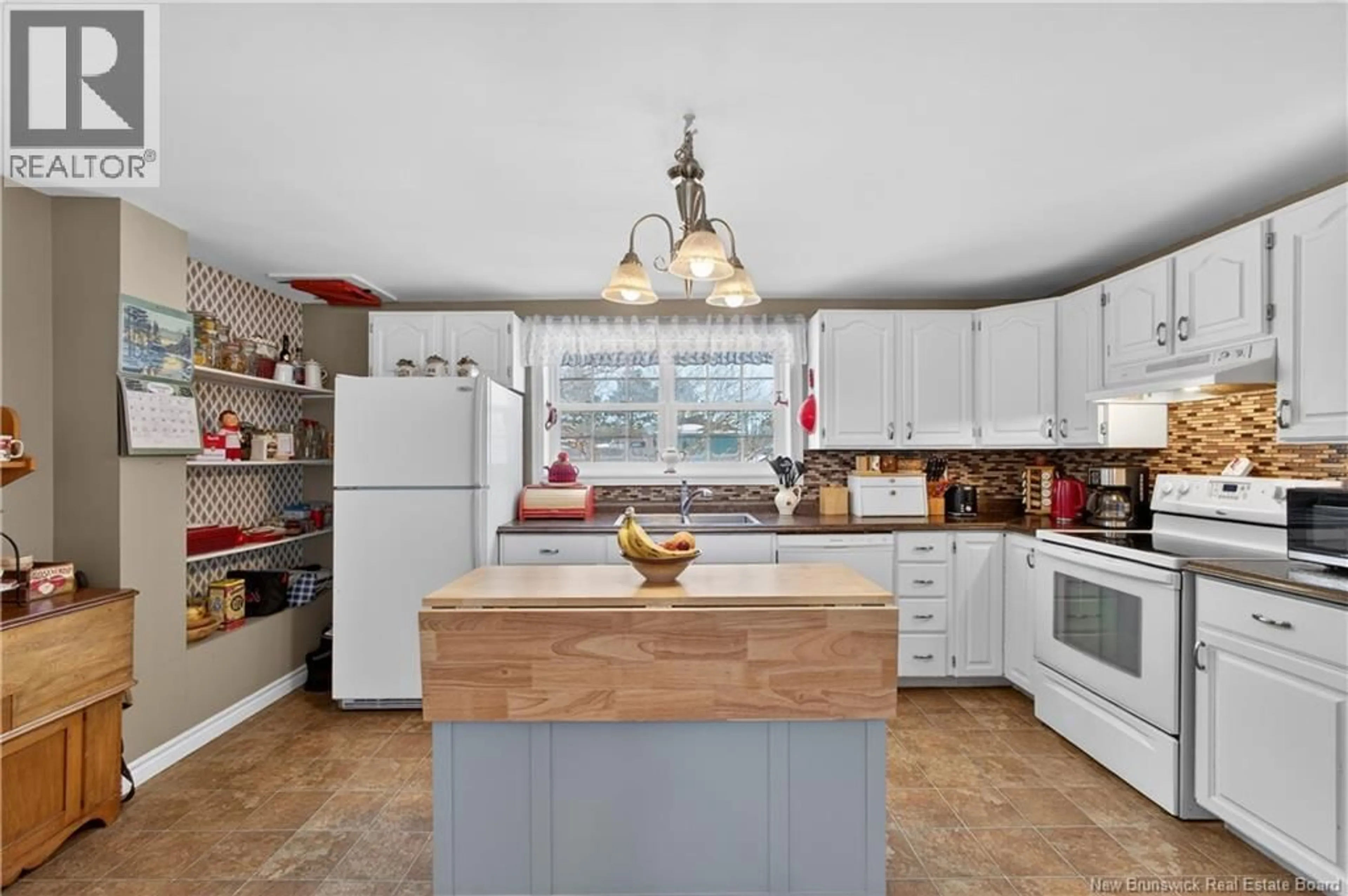 Open concept kitchen, ceramic/tile floor for 87 HILL STREET, Miramichi New Brunswick E1N2H6