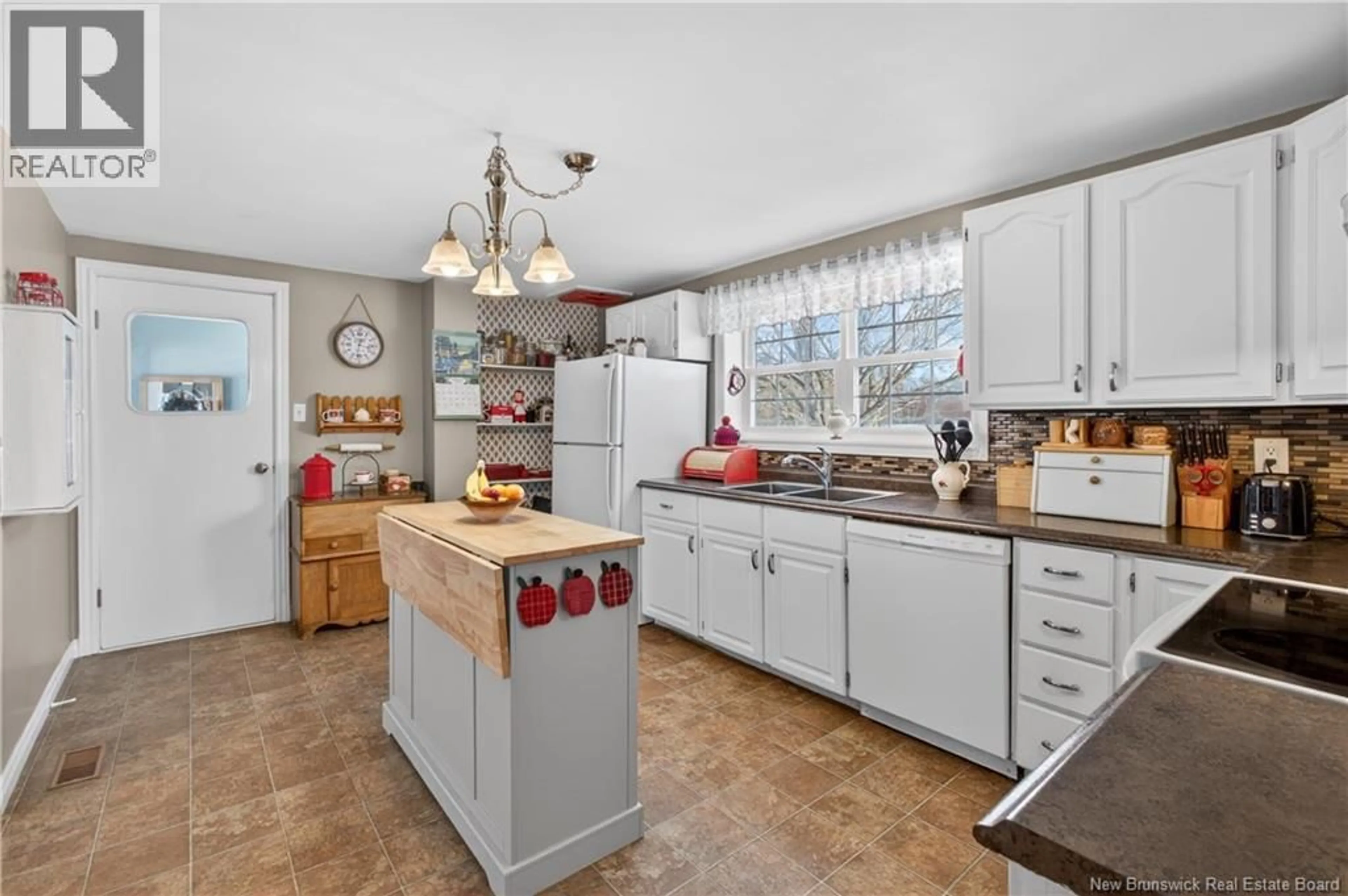 Open concept kitchen, ceramic/tile floor for 87 HILL STREET, Miramichi New Brunswick E1N2H6