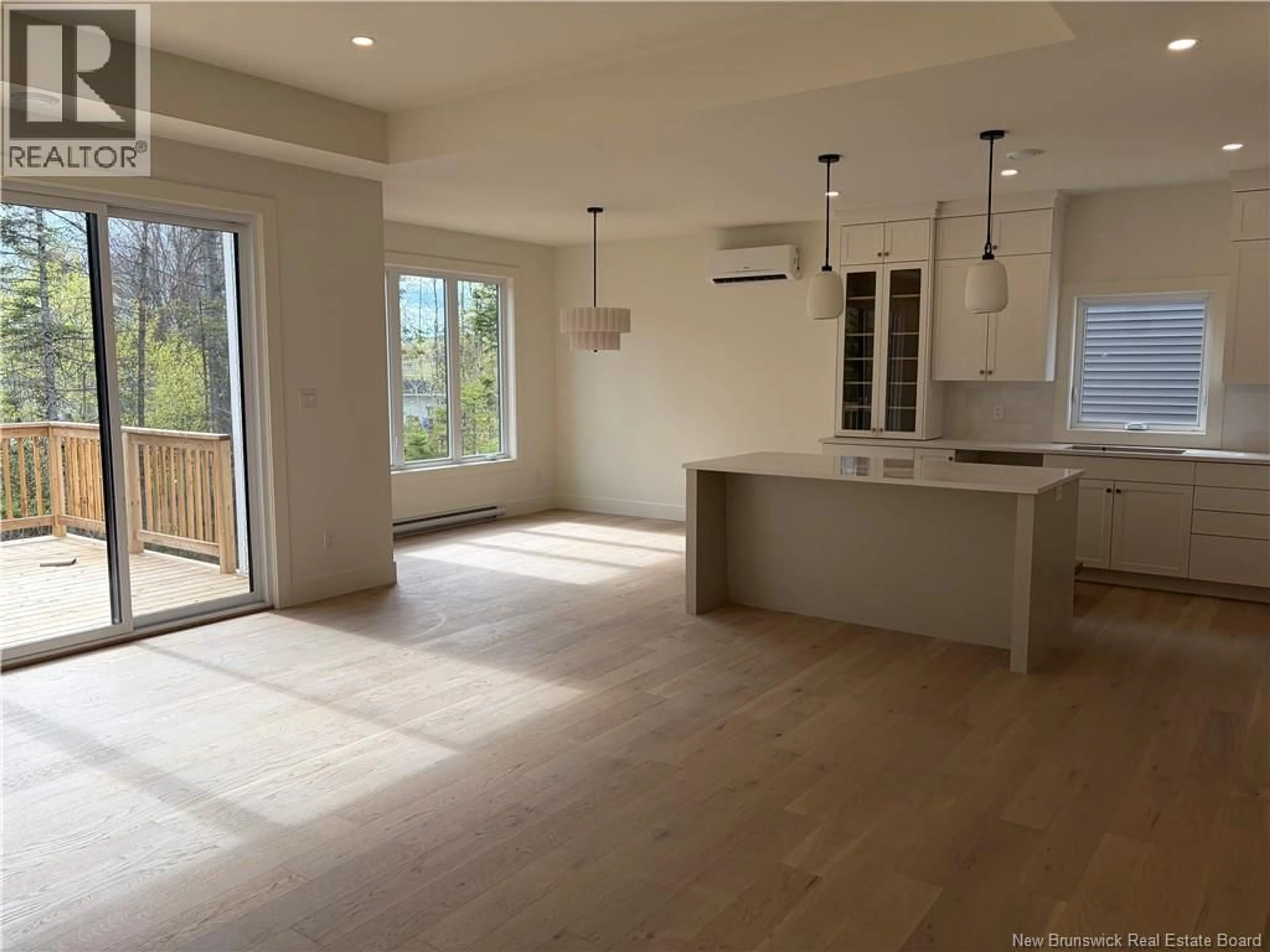 Open concept kitchen, wood/laminate floor for 69 RACHEL STREET, Moncton New Brunswick E1G2V5