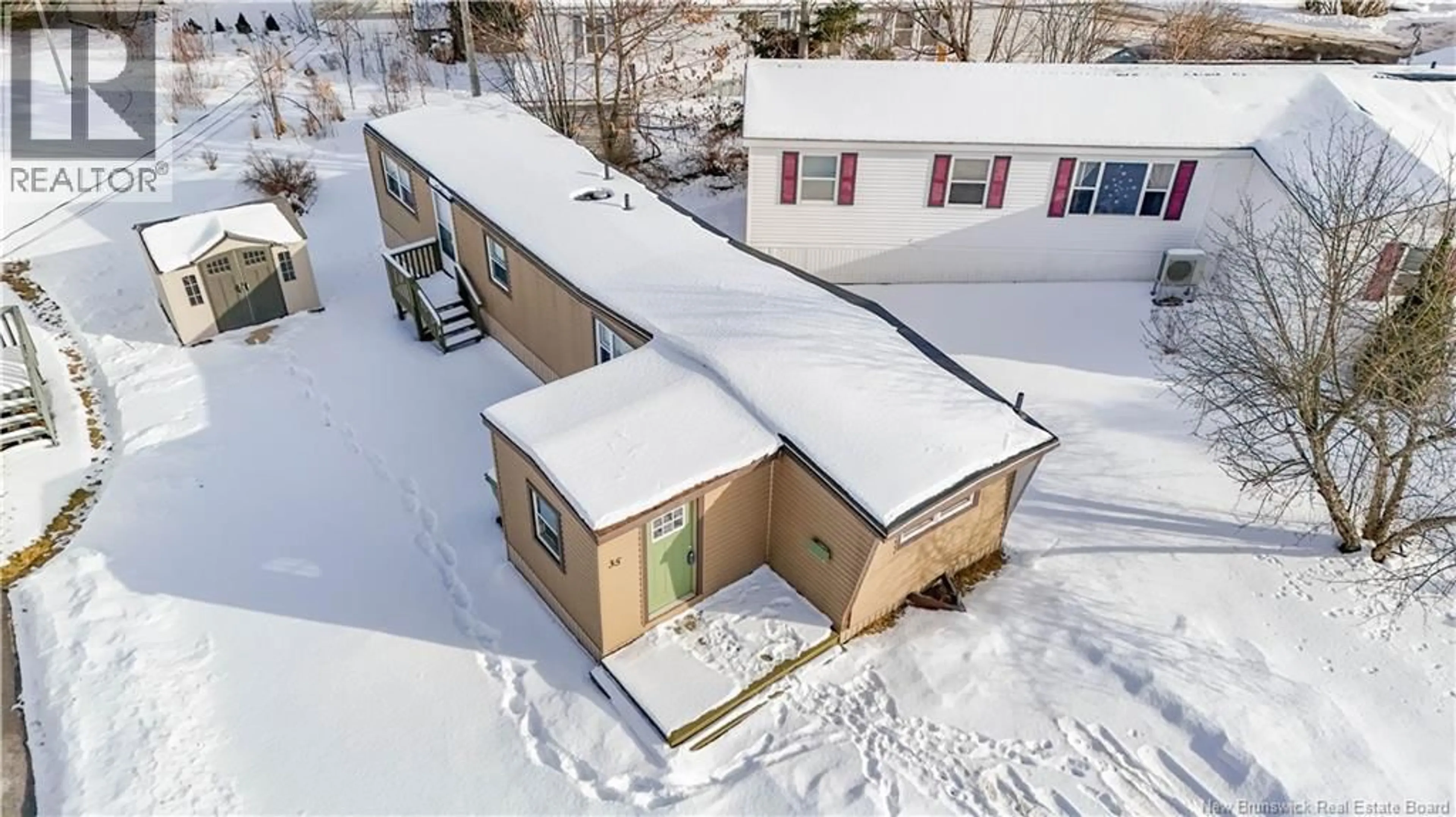 A pic from outside/outdoor area/front of a property/back of a property/a pic from drone, building for 35 KELLY'S DRIVE, Fredericton New Brunswick E3B7R1