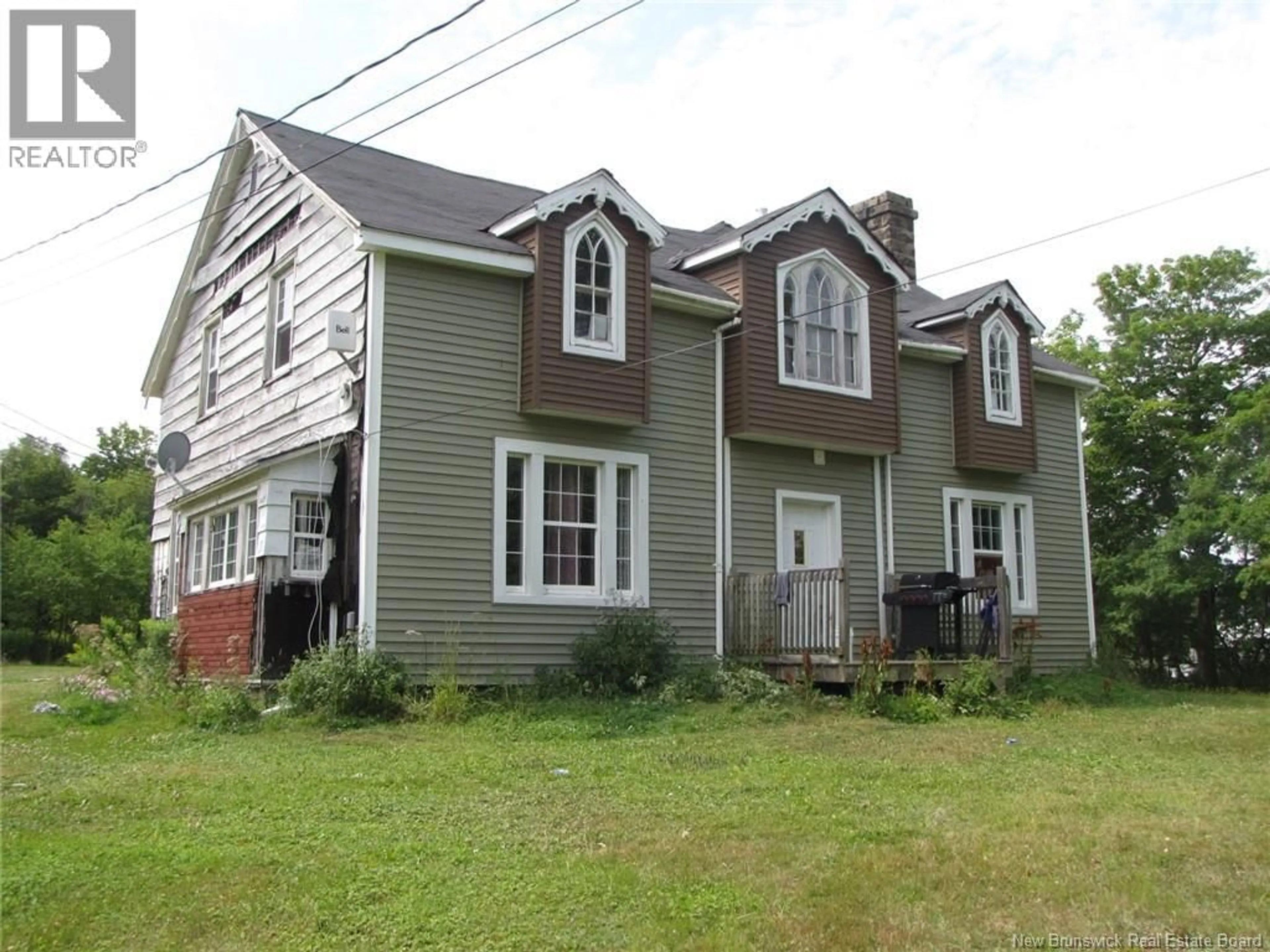 Home with vinyl exterior material, street for 5031 MAIN STREET, Dorchester New Brunswick E4K2X7