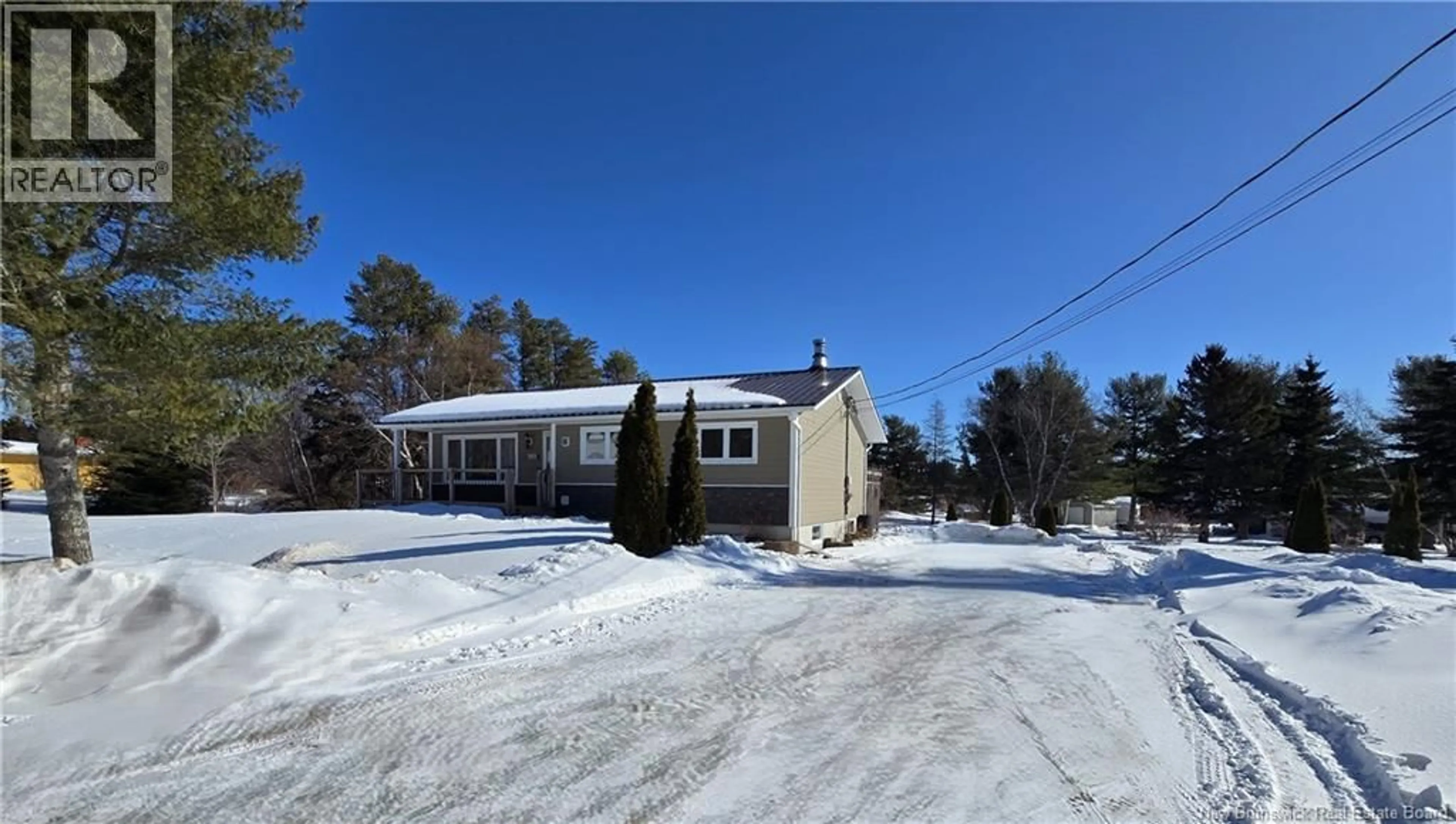 A pic from outside/outdoor area/front of a property/back of a property/a pic from drone, street for 4350 RUE BEAUREGARD, Tracadie New Brunswick E1X1C4