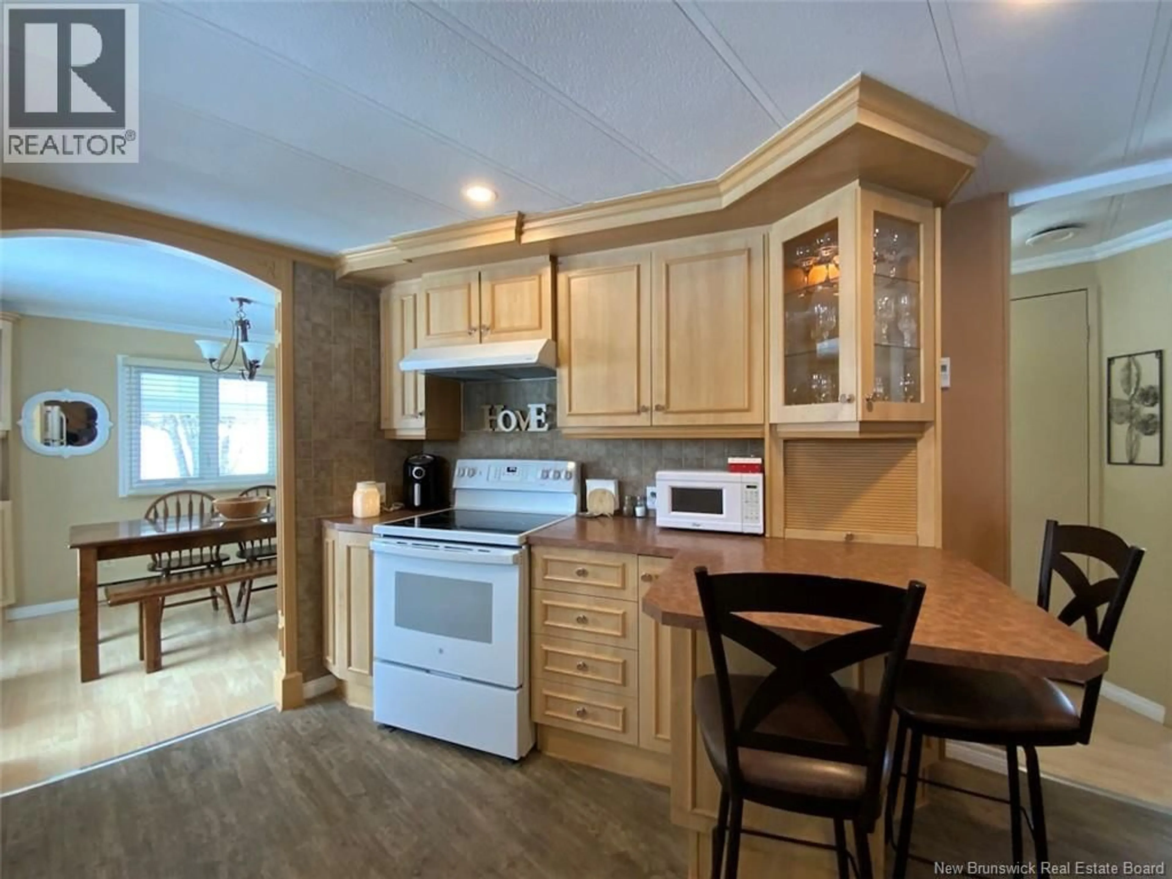 Open concept kitchen, wood/laminate floor for 24 HUDON STREET, Saint-Basile New Brunswick E7C1R4
