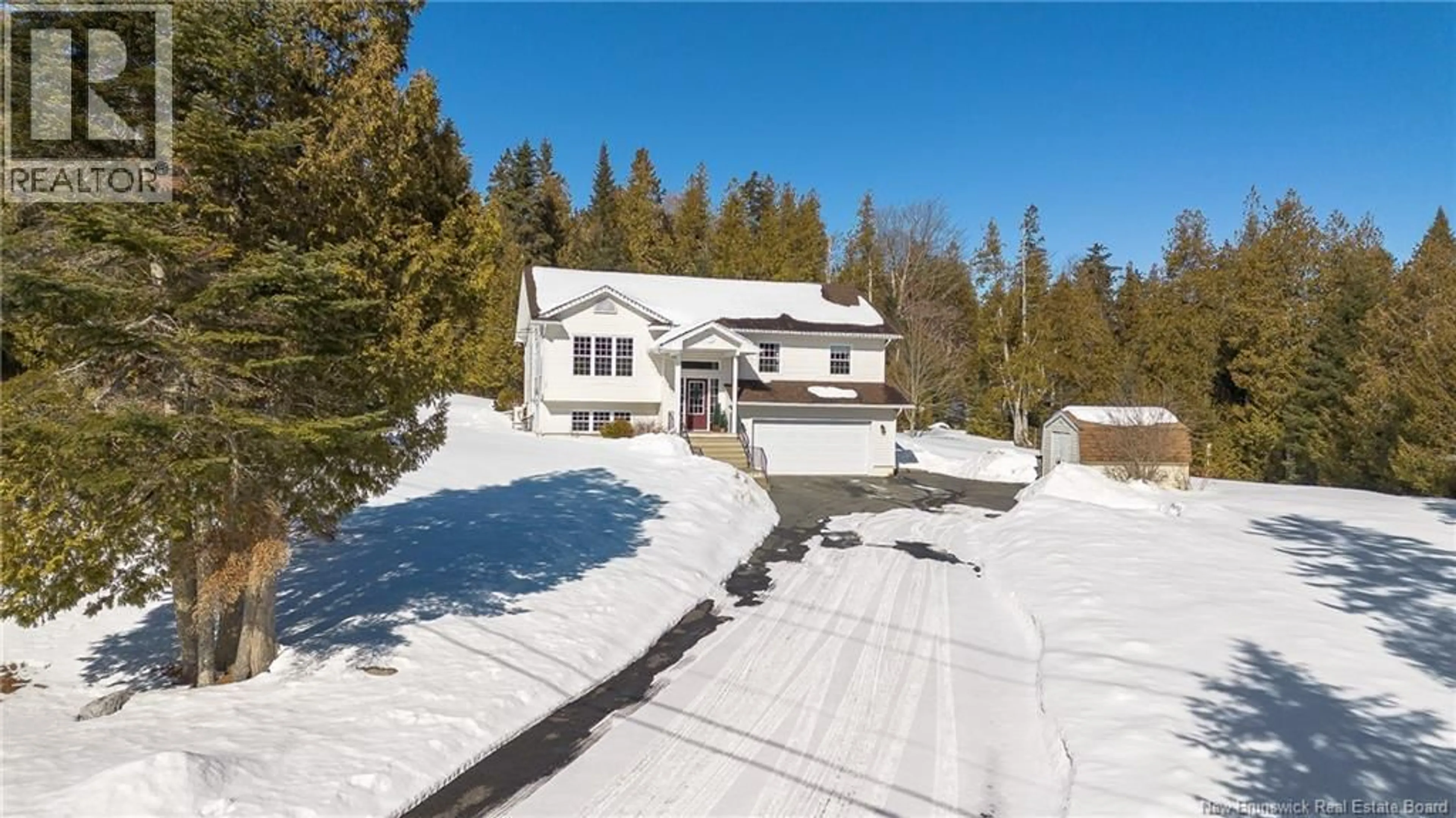 A pic from outside/outdoor area/front of a property/back of a property/a pic from drone, street for 107 ELLIOT ROAD, Quispamsis New Brunswick E2G2B7