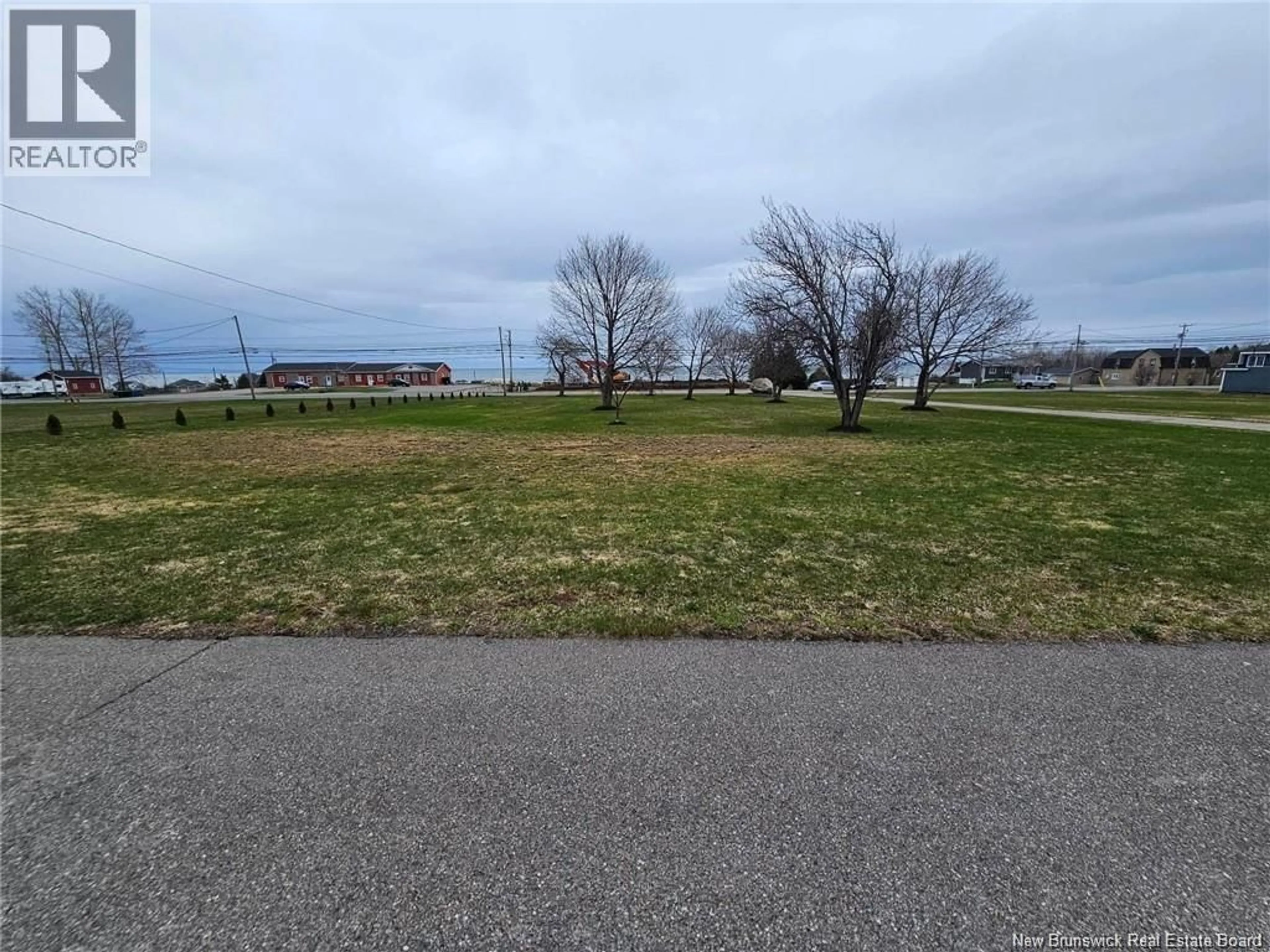 A pic from outside/outdoor area/front of a property/back of a property/a pic from drone, water/lake/river/ocean view for 420 PRINCIPALE, Petit-Rocher New Brunswick E9J1N8