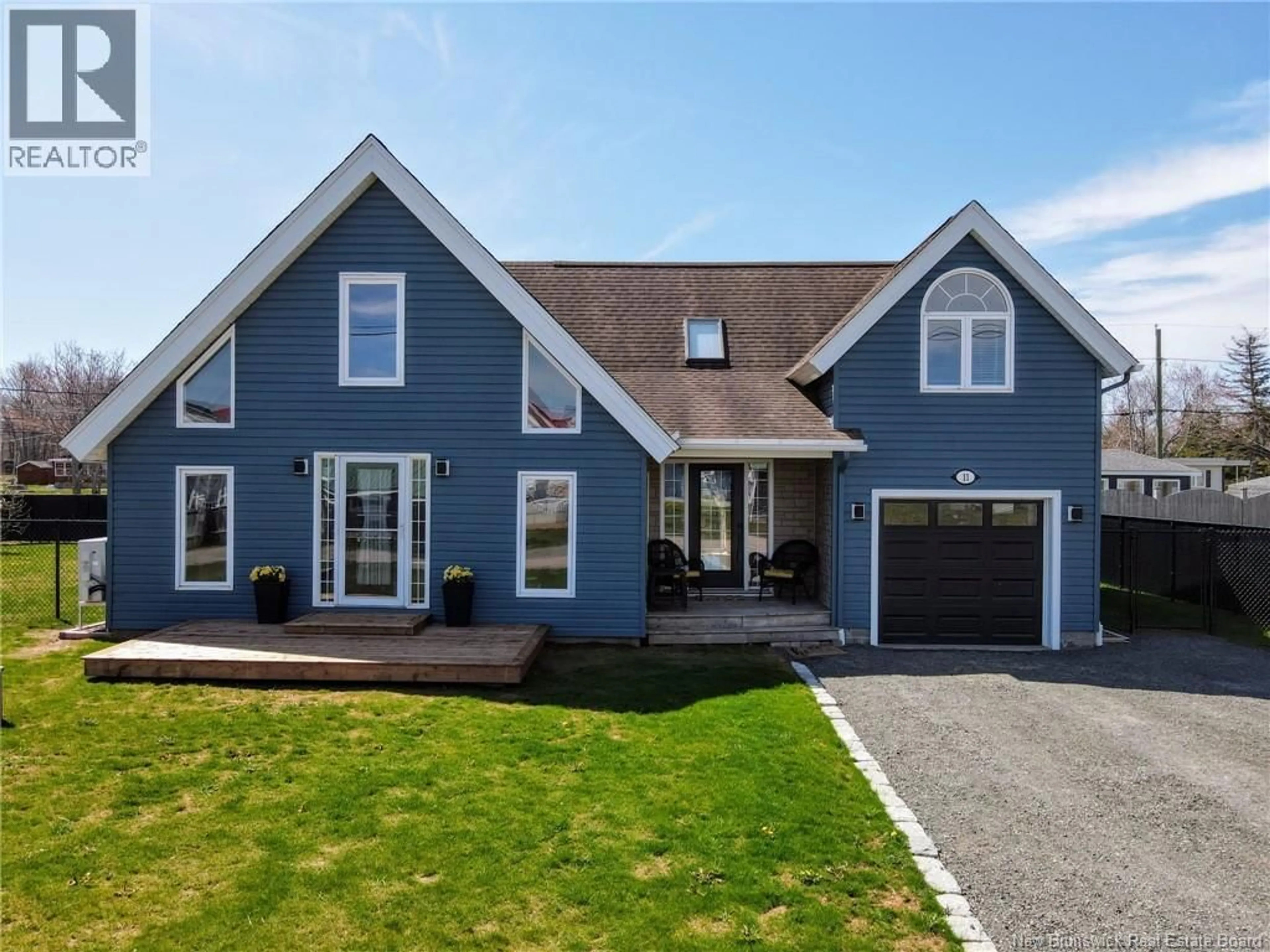 Home with vinyl exterior material, street for 11 BAYBREEZE LANE, Grand-Barachois New Brunswick E4P0Y7