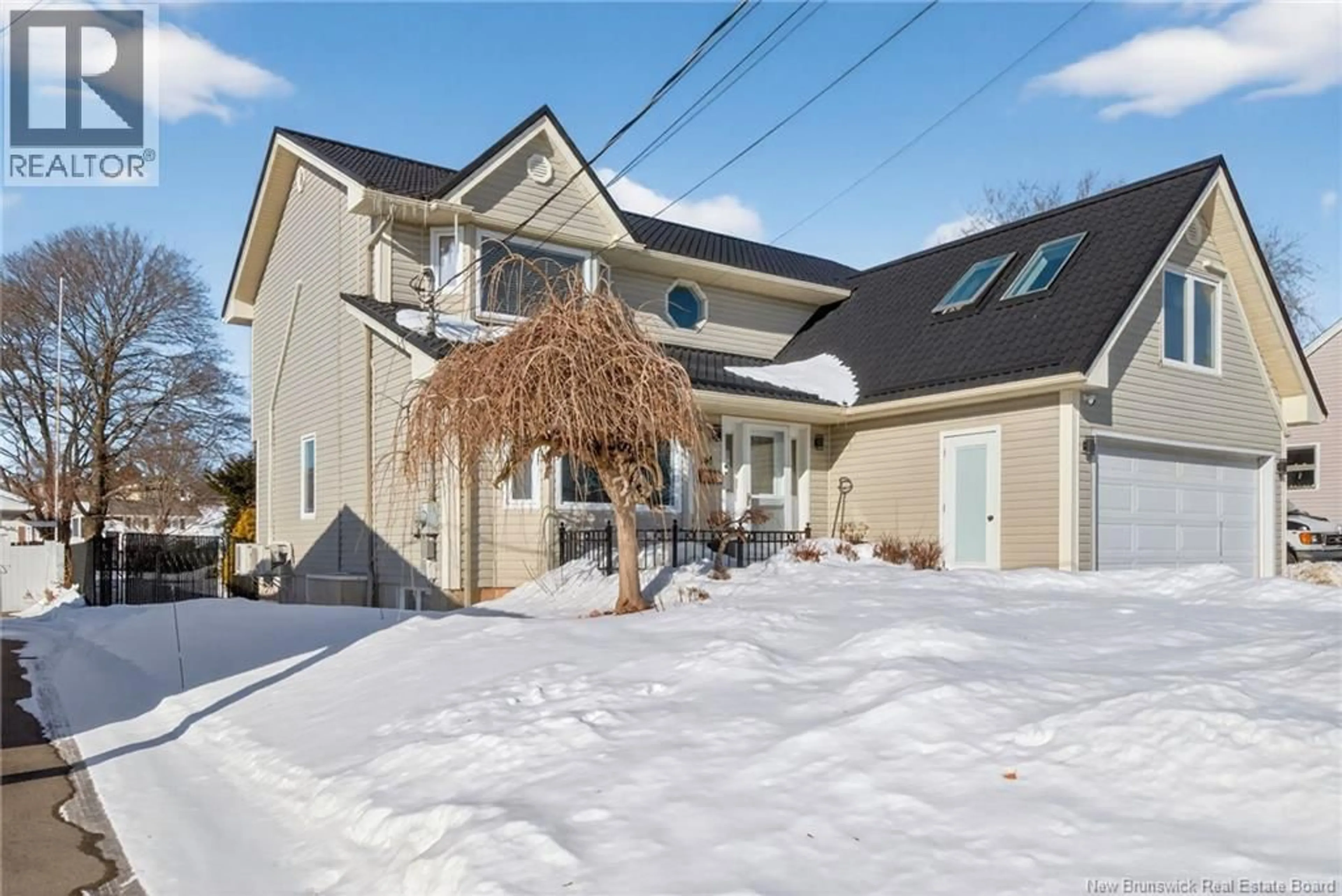 Home with vinyl exterior material, street for 141 GASPE STREET, Dieppe New Brunswick E1A1W4