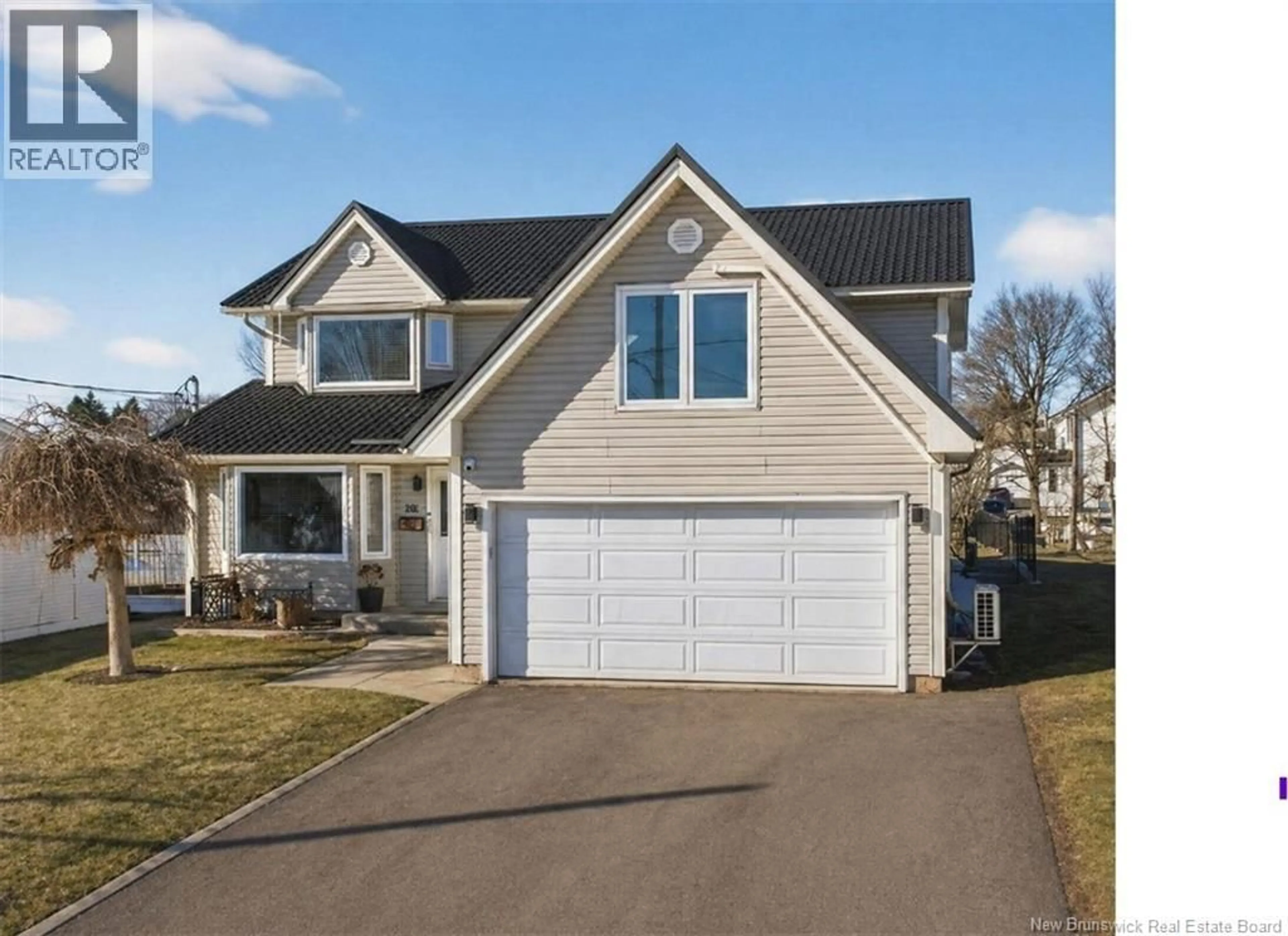 Home with vinyl exterior material, street for 141 GASPE STREET, Dieppe New Brunswick E1A1W4