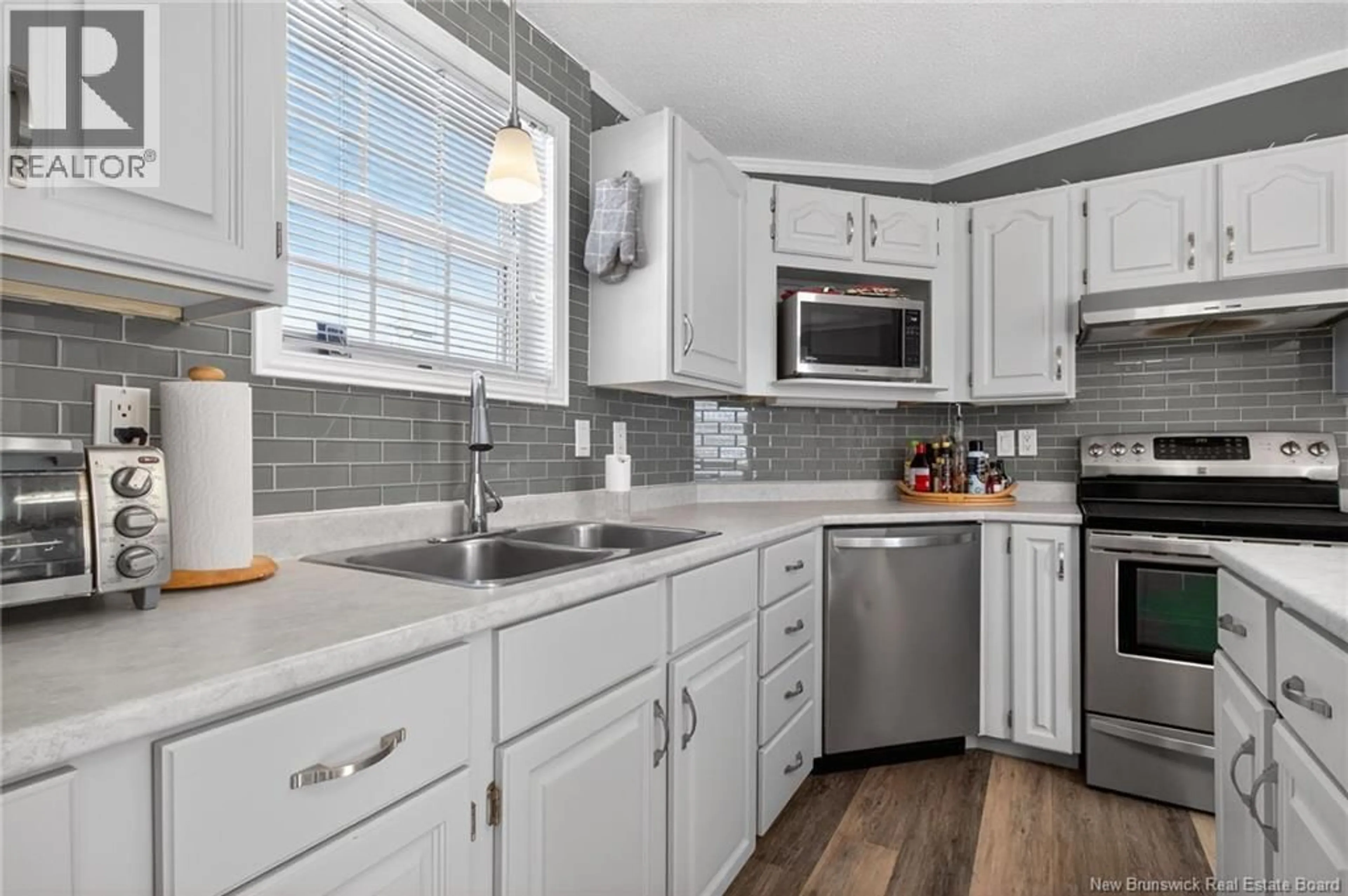 Open concept kitchen, ceramic/tile floor for 8 MAPLE RIDGE LANE, Riverview New Brunswick E1B5H6