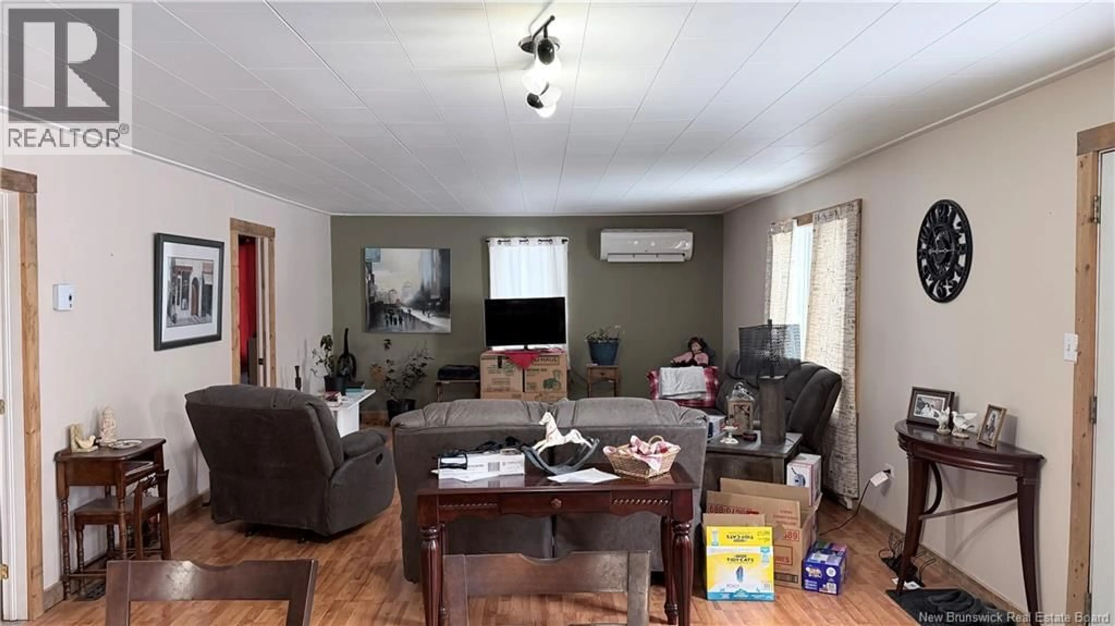 Living room with furniture, wood/laminate floor for 12 PEUPLIERS, Clair New Brunswick E7A2C3