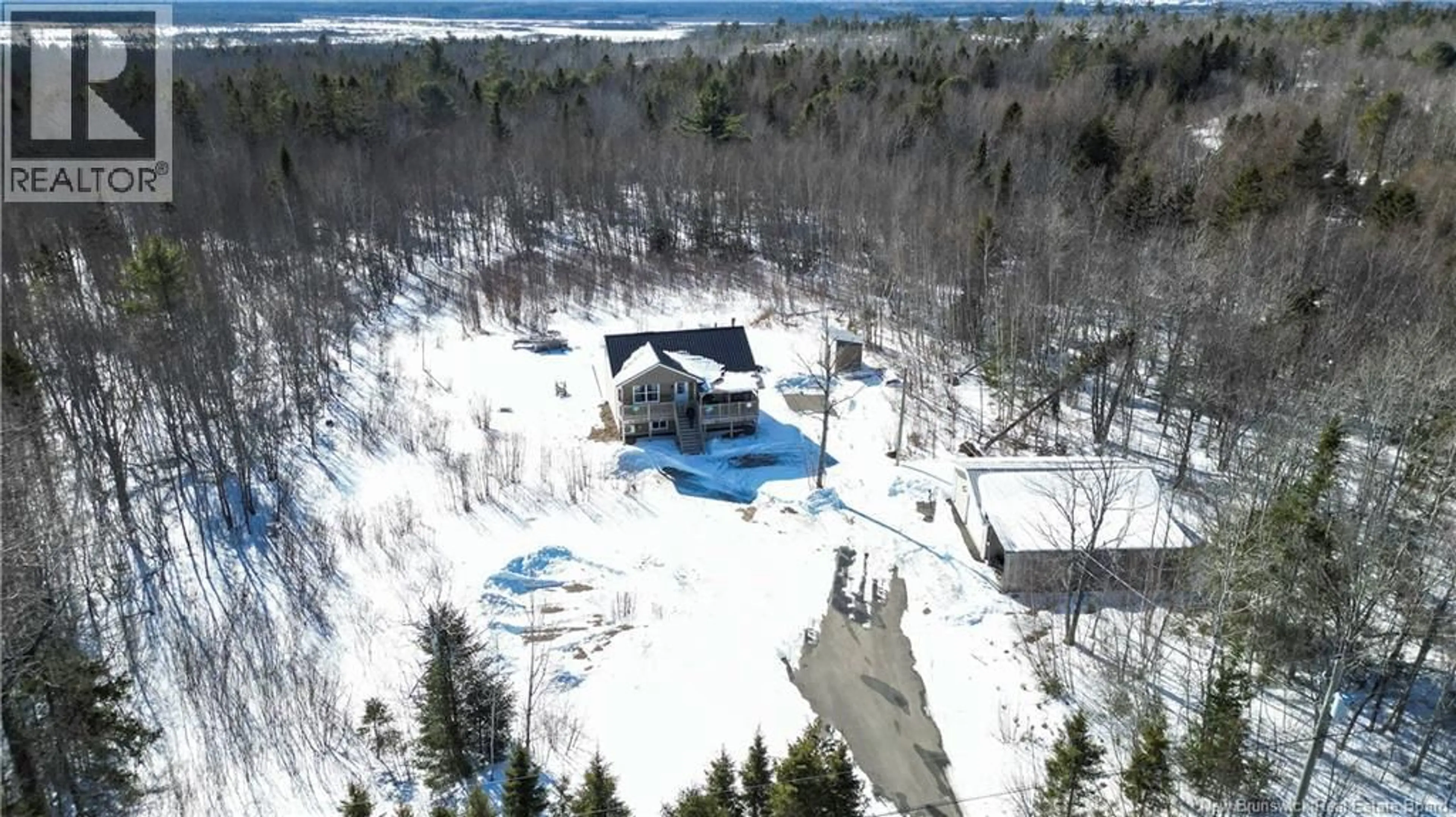 A pic from outside/outdoor area/front of a property/back of a property/a pic from drone, water/lake/river/ocean view for 2187 RTE 645, Harvey New Brunswick E6K3E1