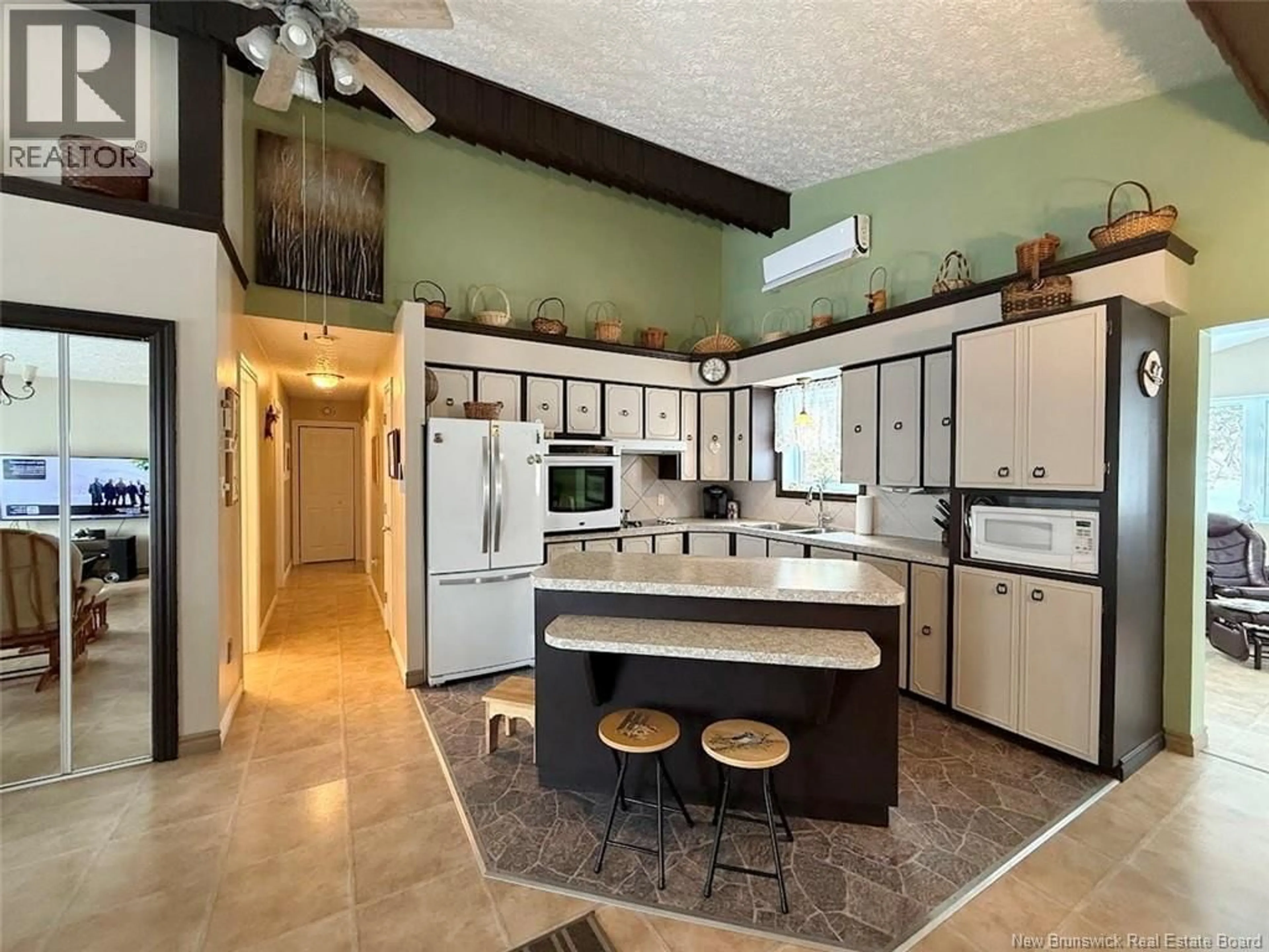 Open concept kitchen, ceramic/tile floor for 2137 CENTRALE STREET, St-Hilaire New Brunswick E3V4V6