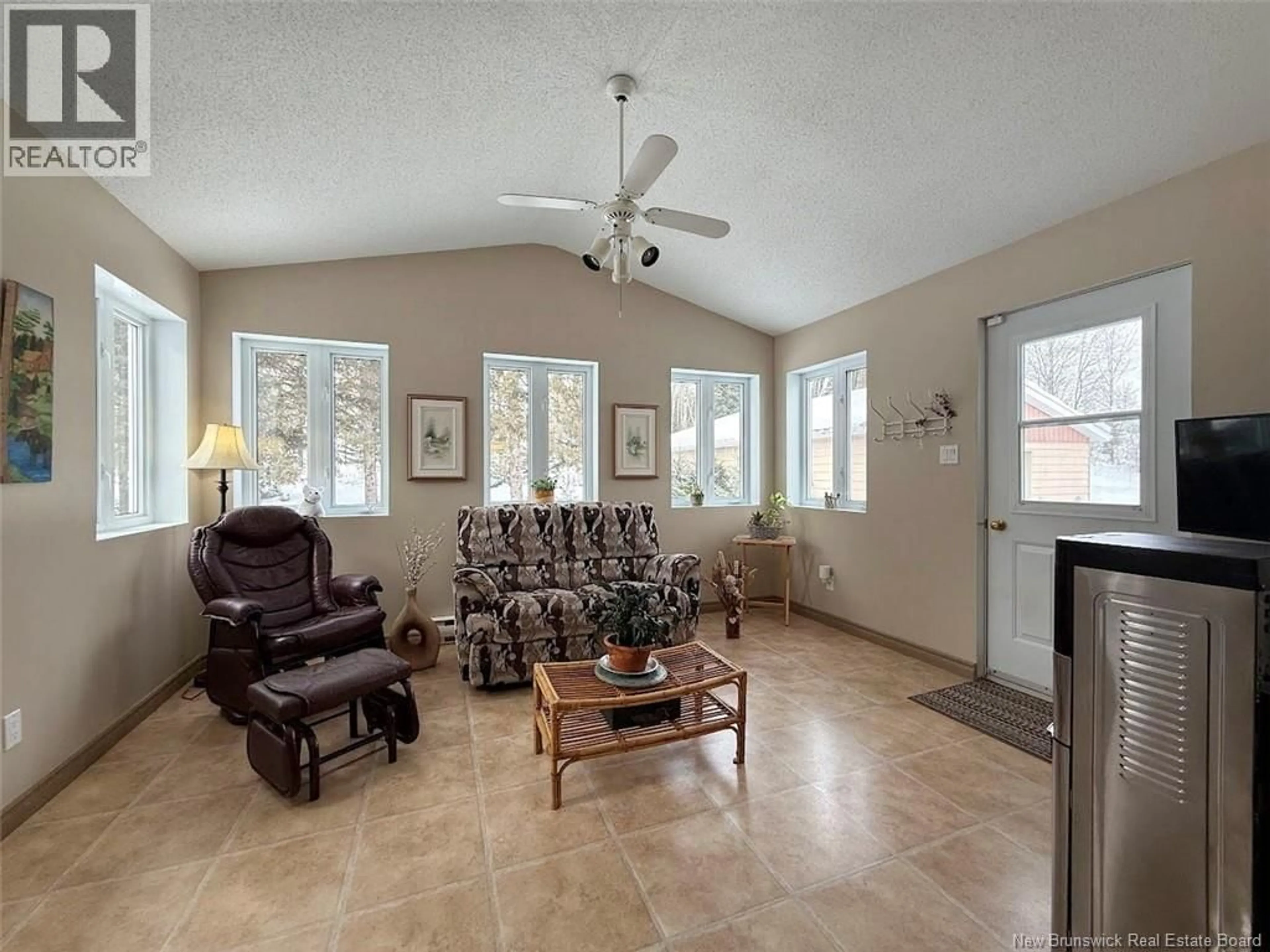 Living room with furniture, ceramic/tile floor for 2137 CENTRALE STREET, St-Hilaire New Brunswick E3V4V6