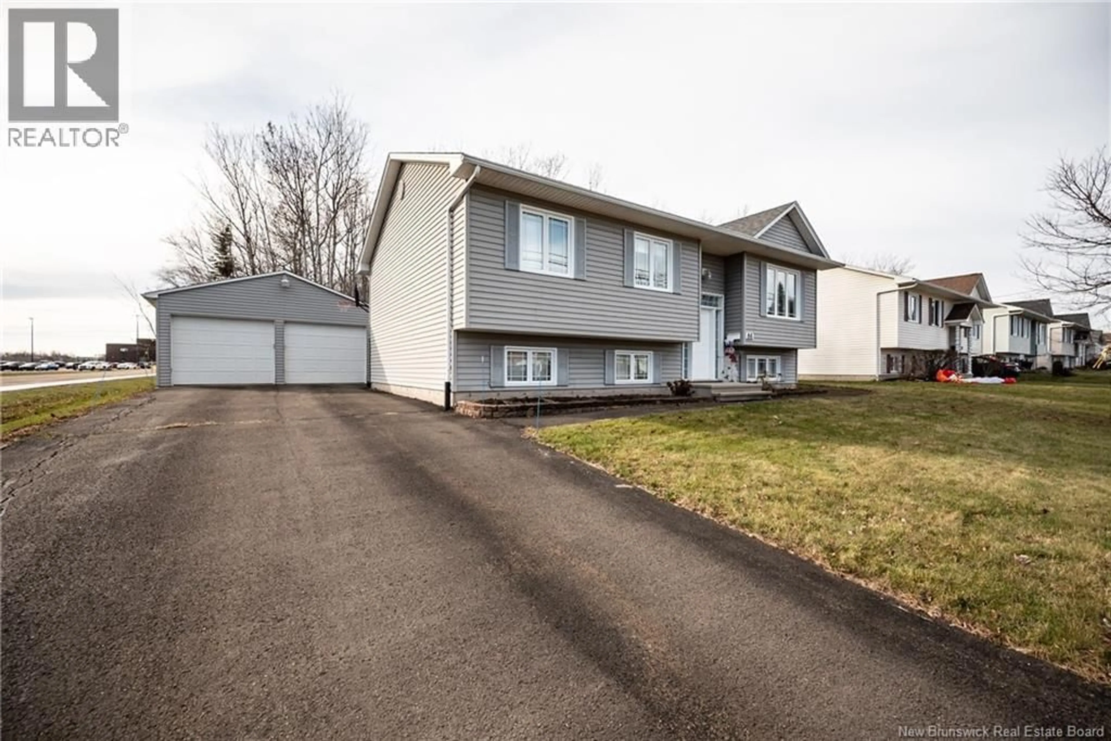 Home with vinyl exterior material, street for 86 SHANNON DRIVE, Moncton New Brunswick E1G4X6