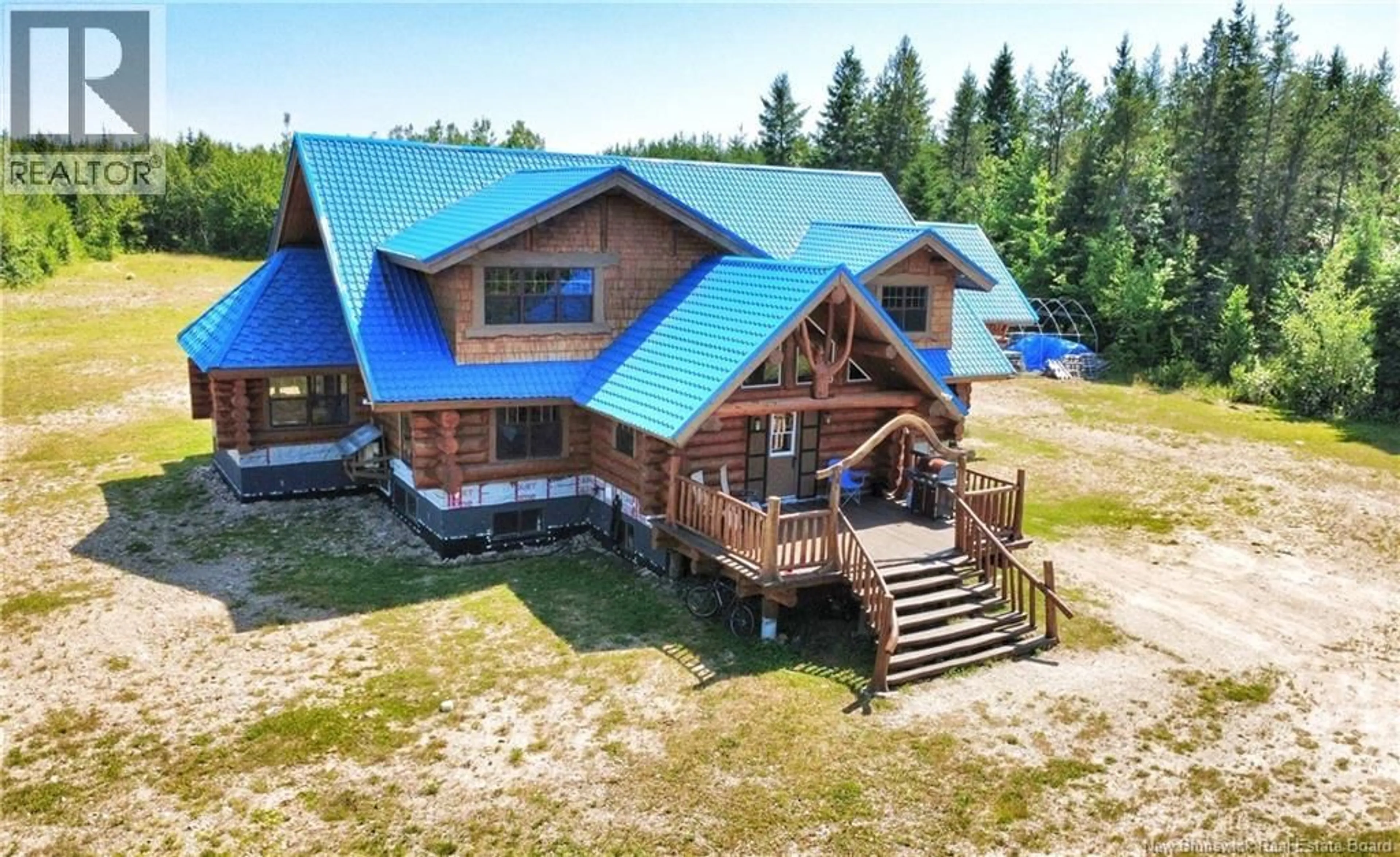 A pic from outside/outdoor area/front of a property/back of a property/a pic from drone, building for 50 CHEM. DUVAL, Petit-Paquetville New Brunswick E8R2C7