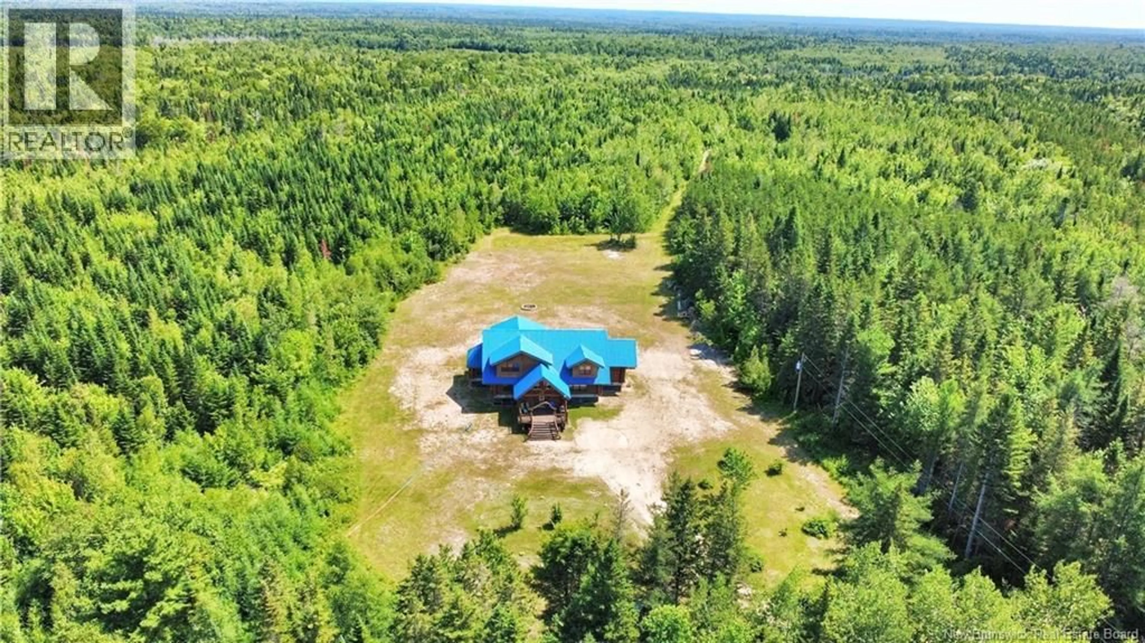 A pic from outside/outdoor area/front of a property/back of a property/a pic from drone, forest/trees view for 50 CHEM. DUVAL, Petit-Paquetville New Brunswick E8R2C7