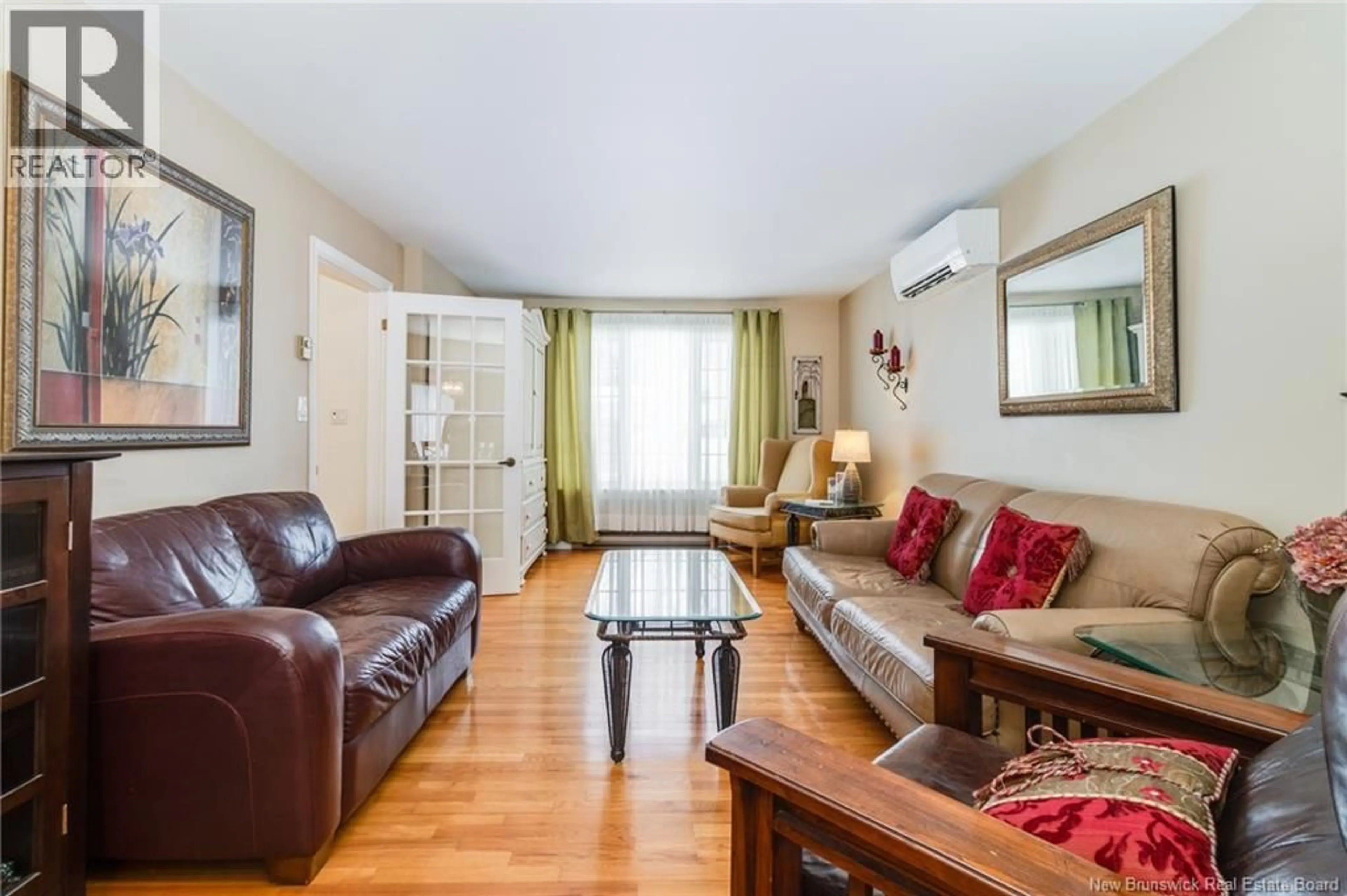 Living room with furniture, wood/laminate floor for 103 CORTLAND AVENUE, New Maryland New Brunswick E3C1B6