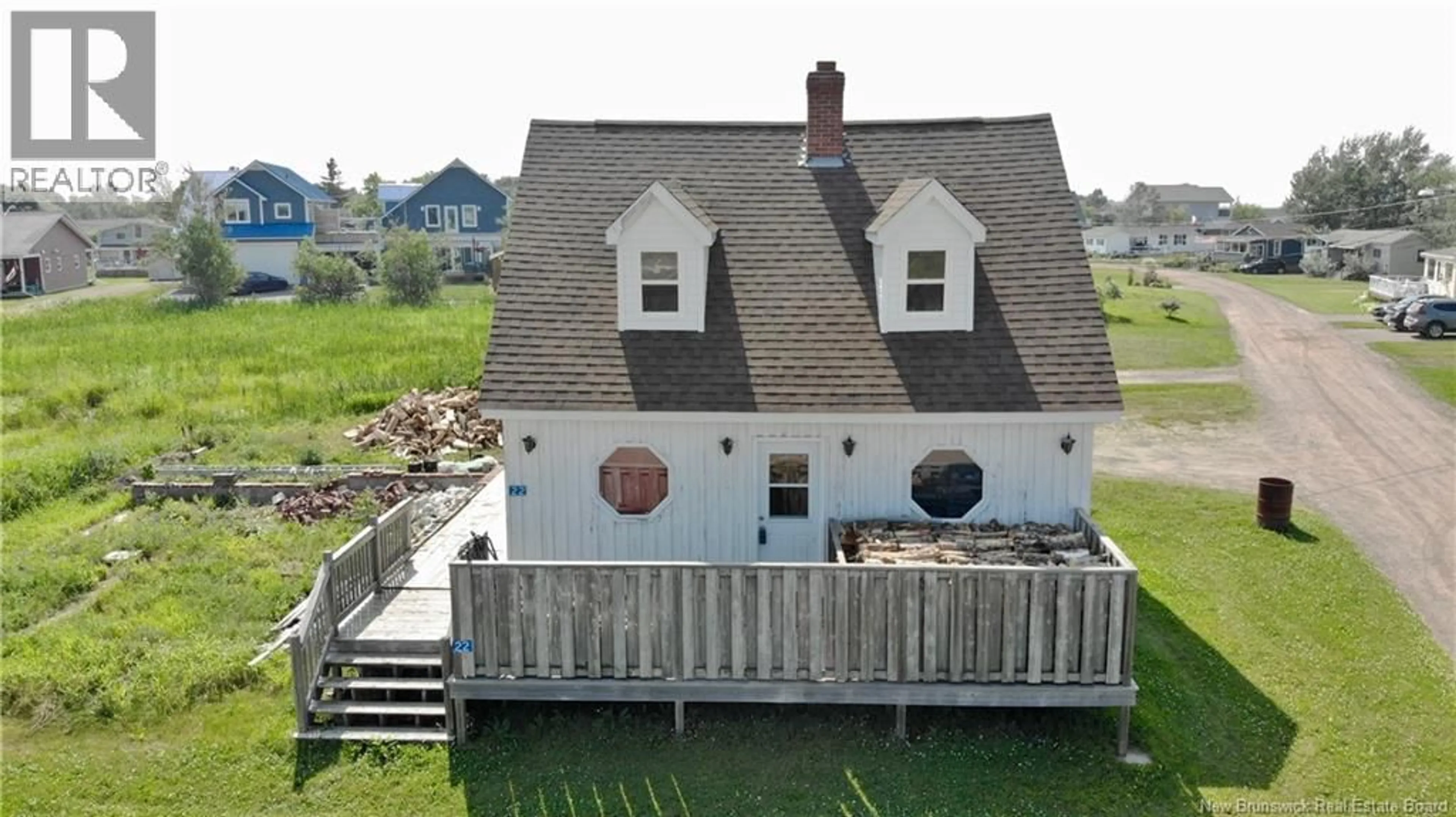 A pic from outside/outdoor area/front of a property/back of a property/a pic from drone, unknown for 22 BEACH STREET, Pointe-Du-Chêne New Brunswick E4P3V7