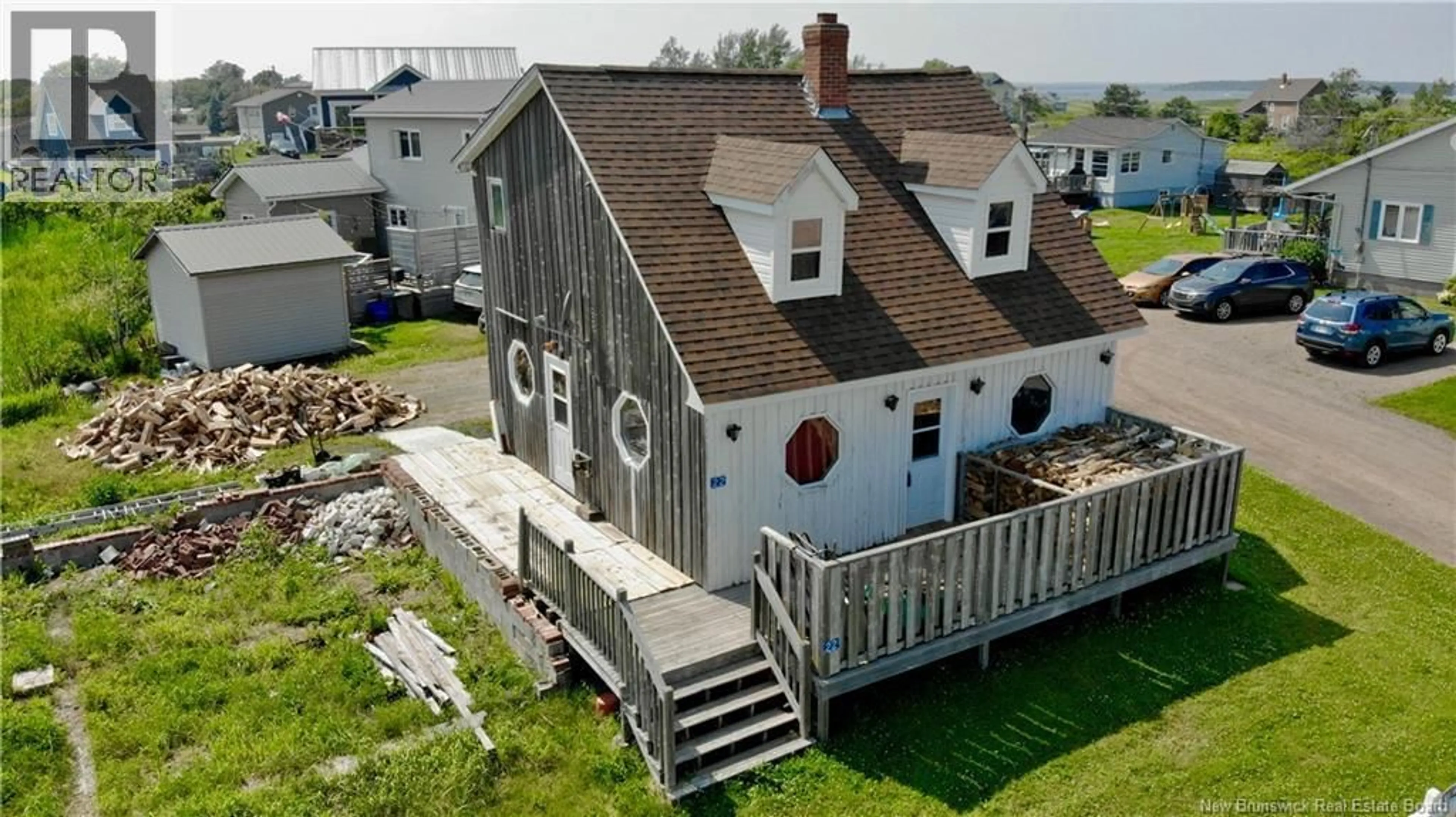 A pic from outside/outdoor area/front of a property/back of a property/a pic from drone, building for 22 BEACH STREET, Pointe-Du-Chêne New Brunswick E4P3V7