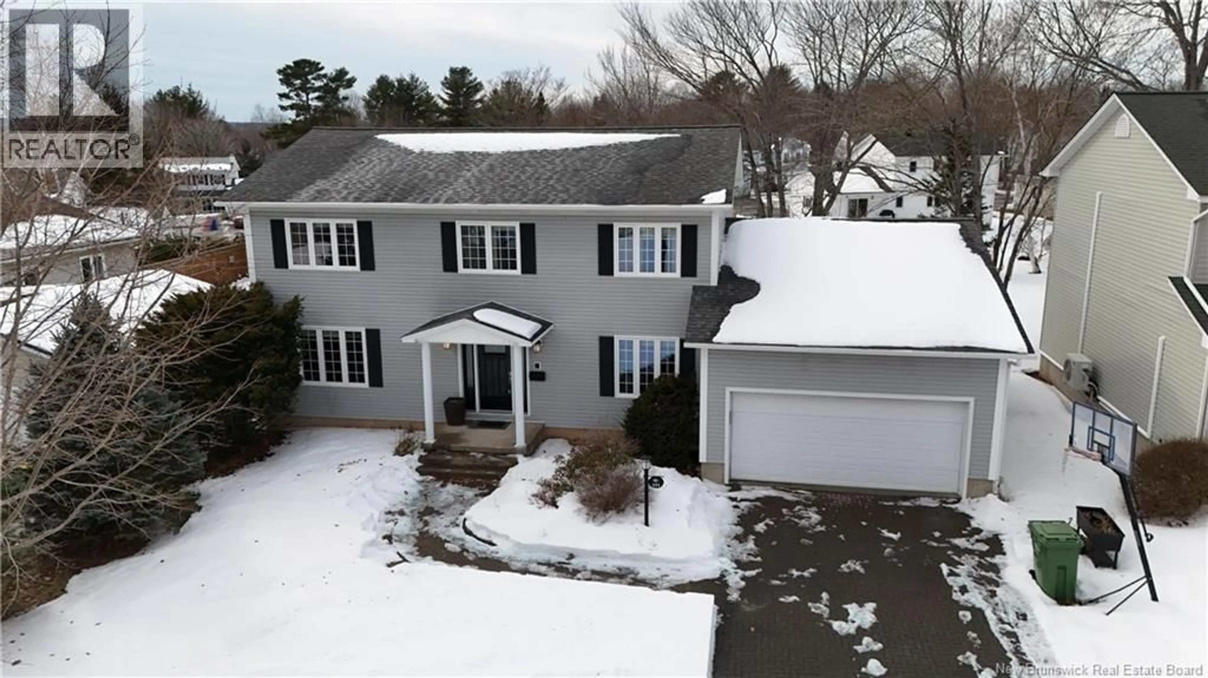 A pic from outside/outdoor area/front of a property/back of a property/a pic from drone, street for 131 WIGGINS DRIVE, Fredericton New Brunswick E3A5N7