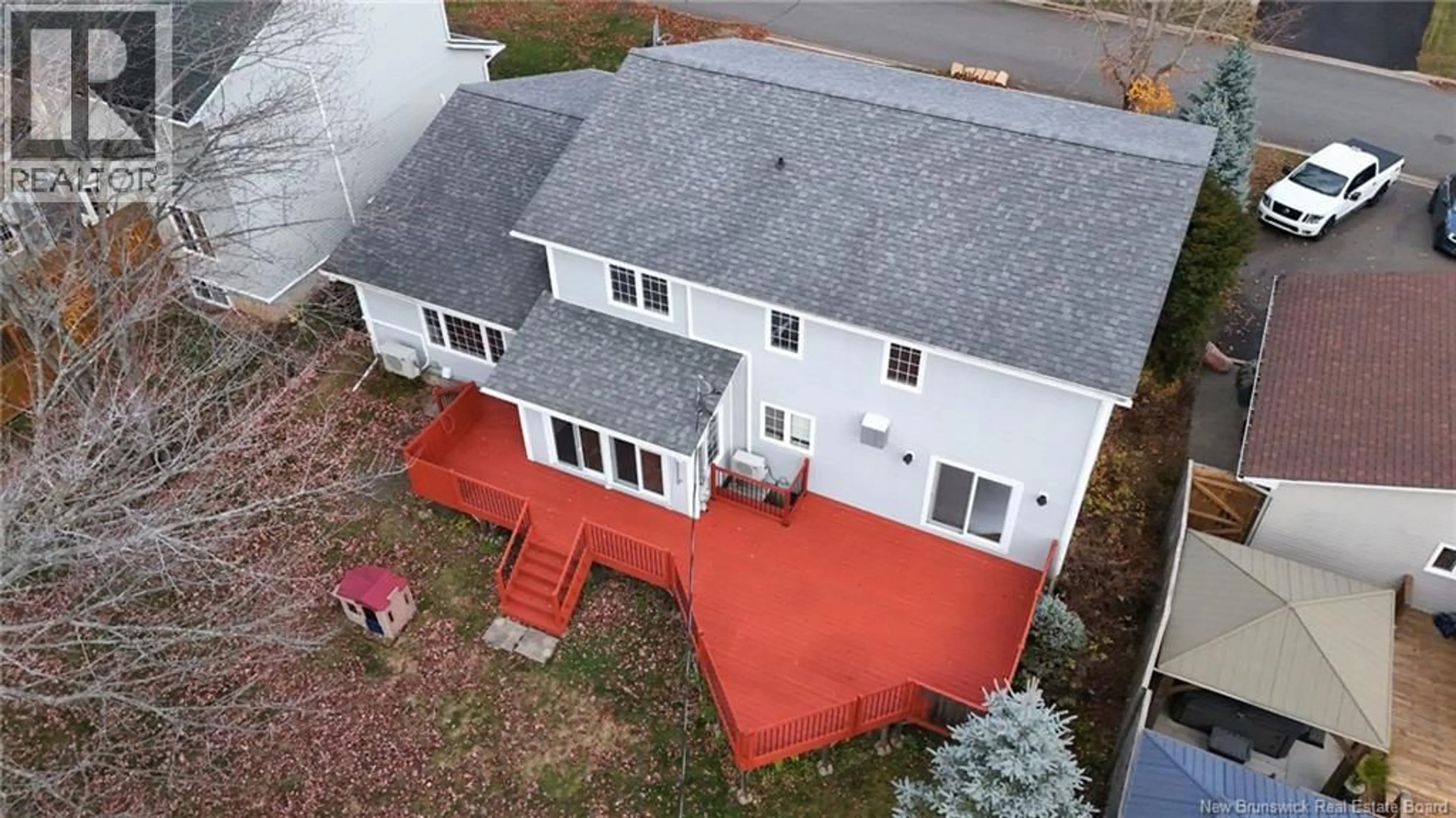 A pic from outside/outdoor area/front of a property/back of a property/a pic from drone, building for 131 WIGGINS DRIVE, Fredericton New Brunswick E3A5N7