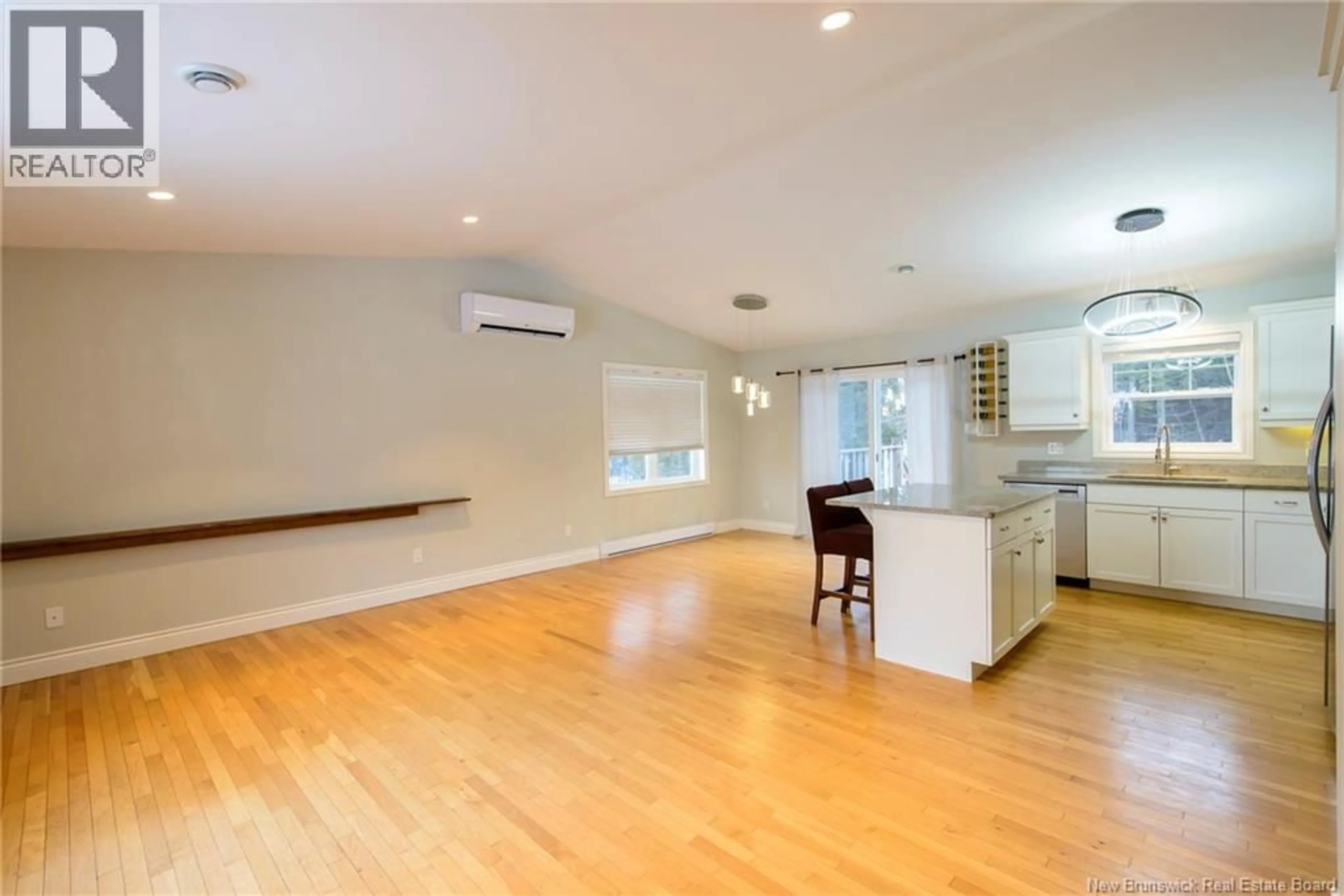 Open concept kitchen, wood/laminate floor for 45 SHERWOOD DRIVE, Saint John New Brunswick E2J3H7