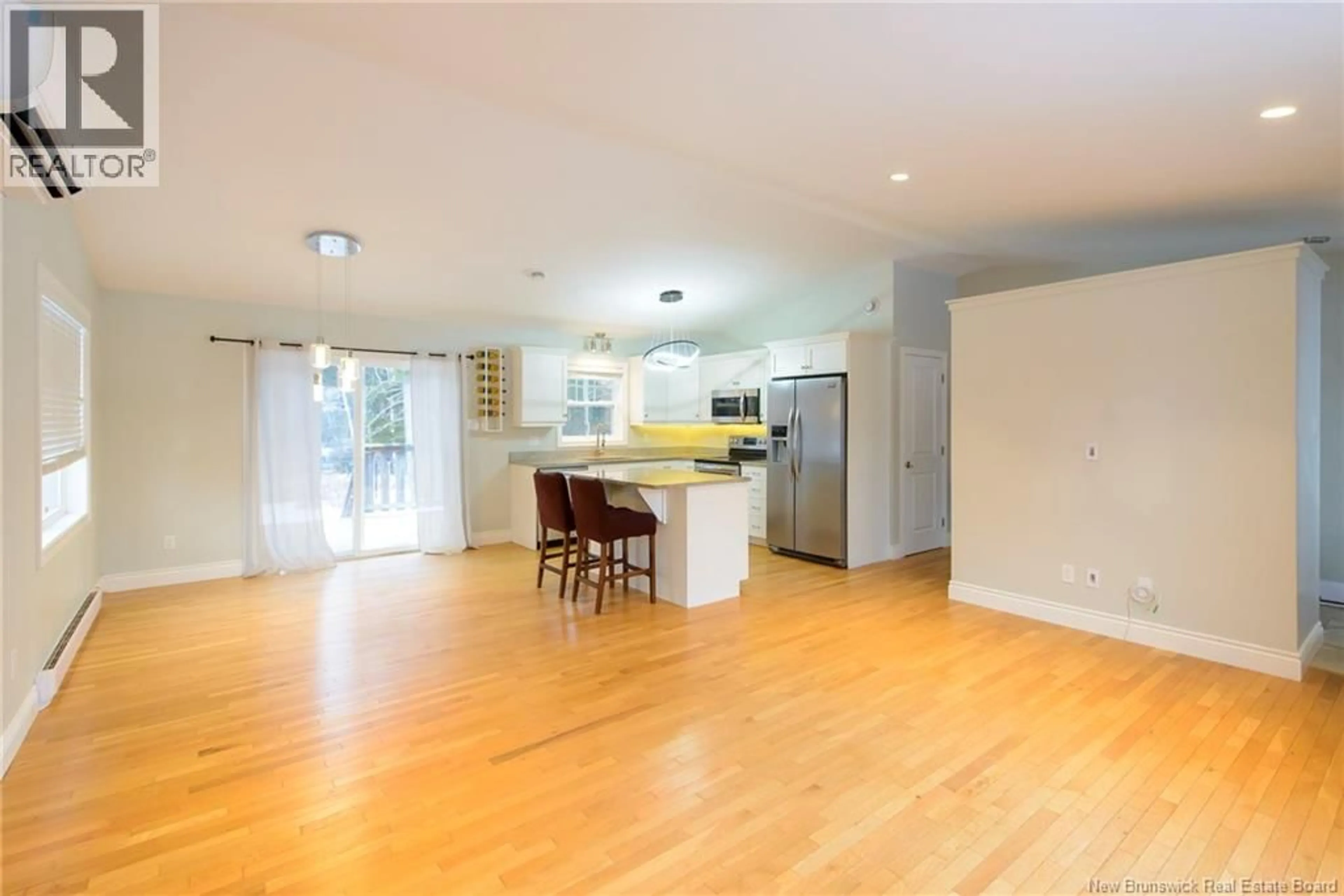 Open concept kitchen, wood/laminate floor for 45 SHERWOOD DRIVE, Saint John New Brunswick E2J3H7