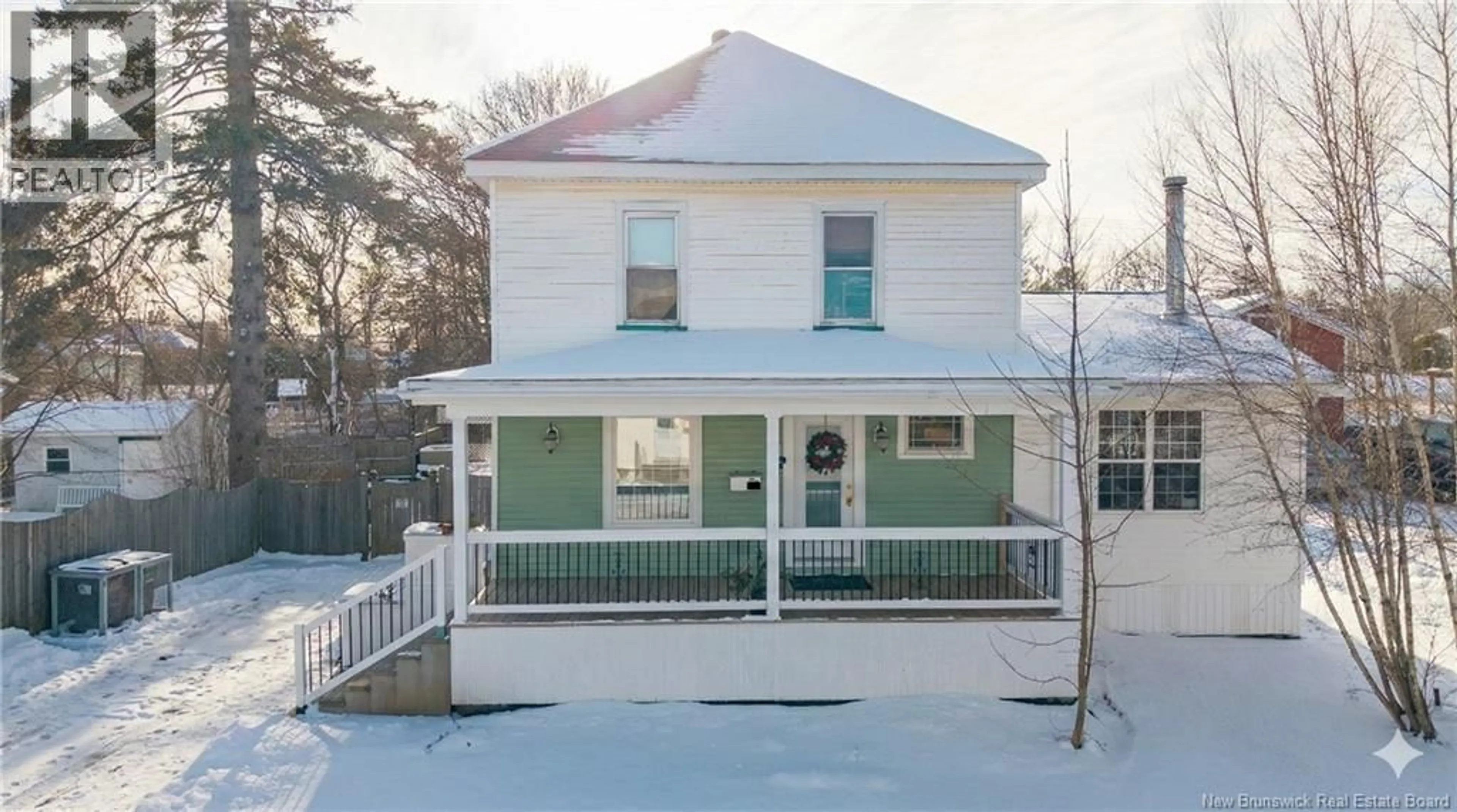 Home with vinyl exterior material, street for 15 QUEEN E STREET, St. Stephen New Brunswick E3L2H9