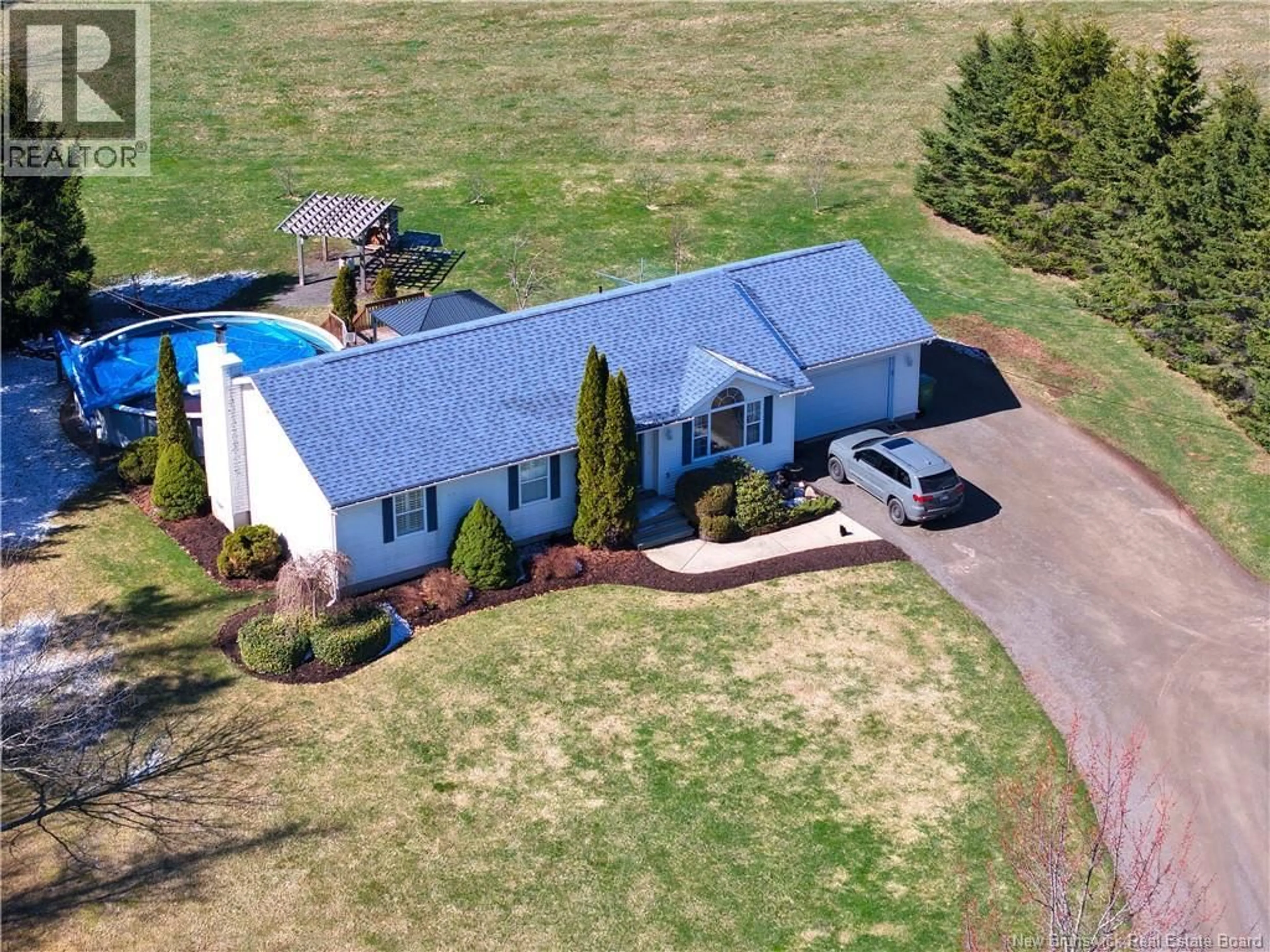 A pic from outside/outdoor area/front of a property/back of a property/a pic from drone, unknown for 2922 FREDERICTON ROAD, Salisbury New Brunswick E4J2G1