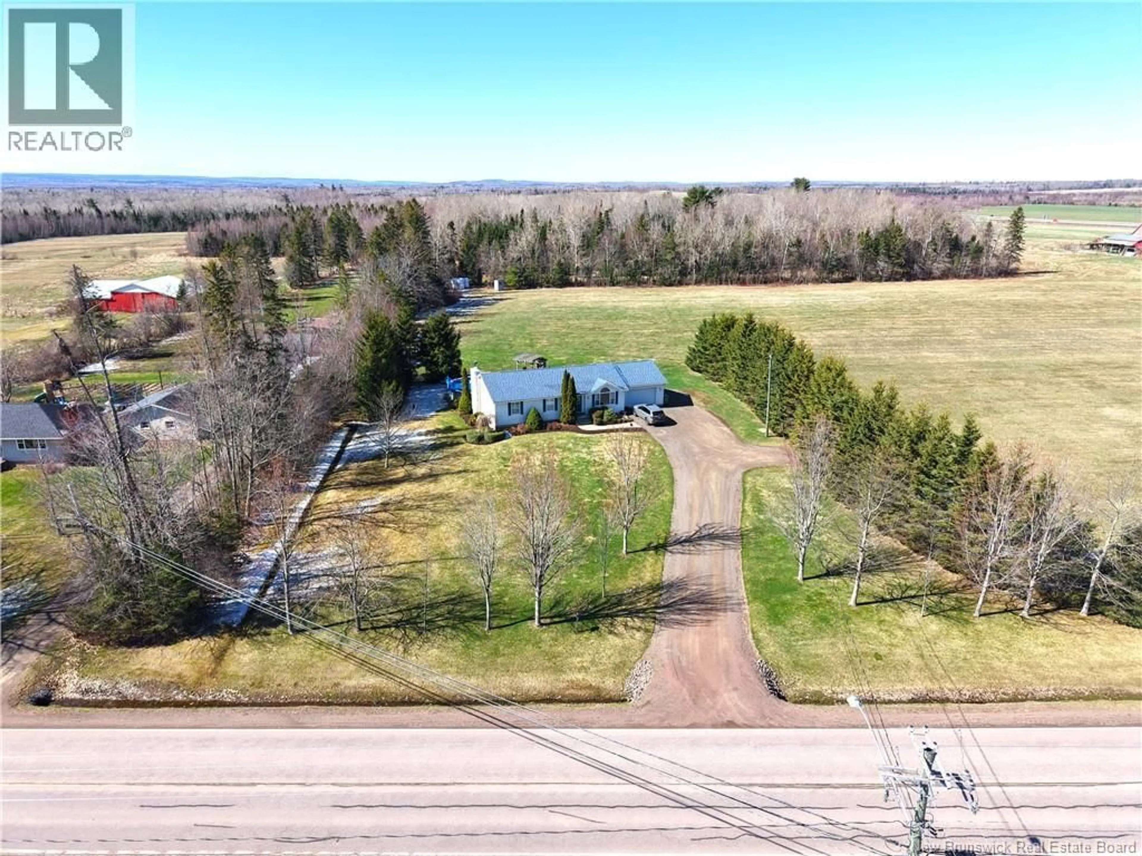 A pic from outside/outdoor area/front of a property/back of a property/a pic from drone, unknown for 2922 FREDERICTON ROAD, Salisbury New Brunswick E4J2G1