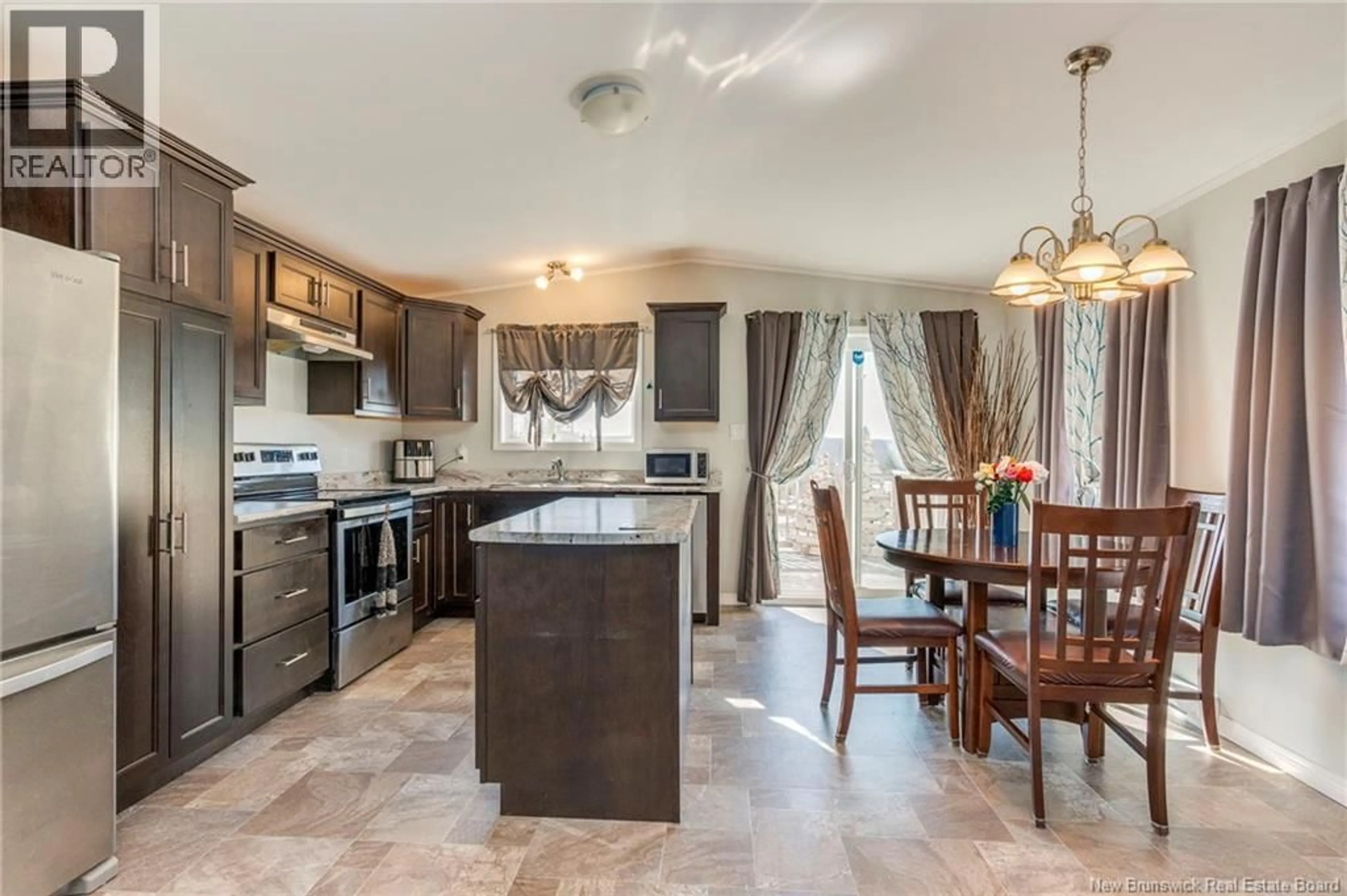 Open concept kitchen, ceramic/tile floor for 14 TELEX LANE, Dieppe New Brunswick E1A8H5