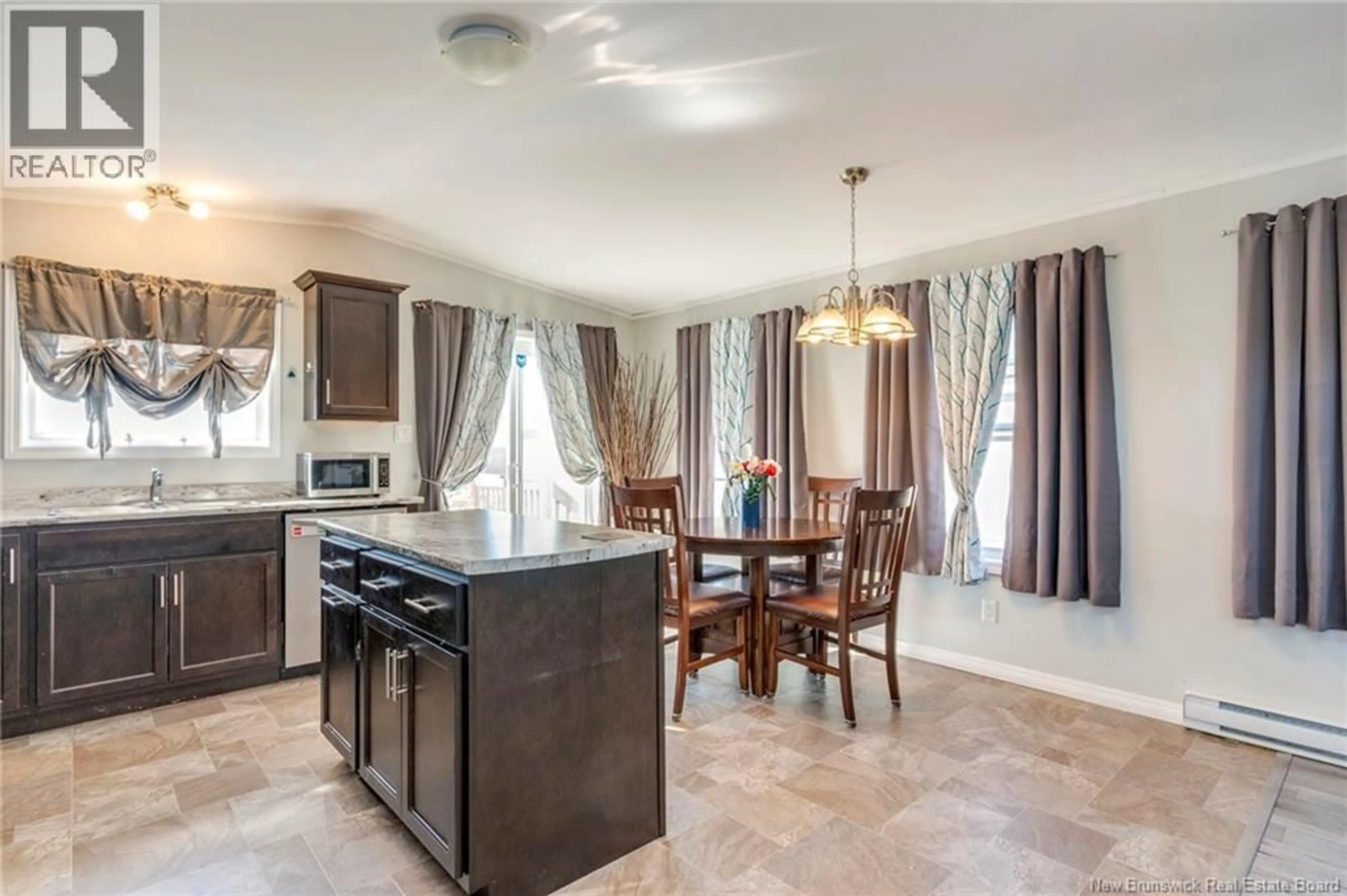 Open concept kitchen, ceramic/tile floor for 14 TELEX LANE, Dieppe New Brunswick E1A8H5