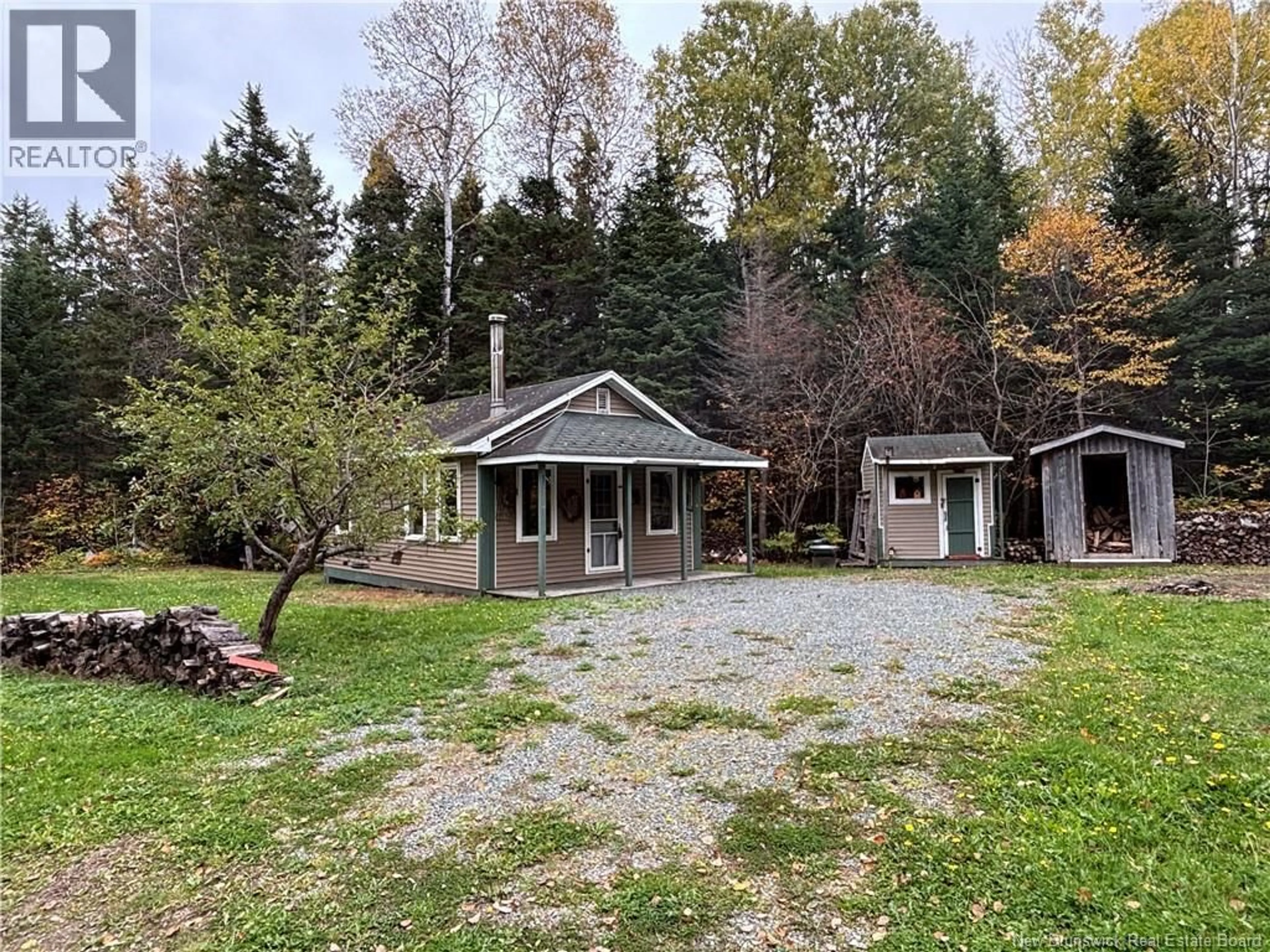 A pic from outside/outdoor area/front of a property/back of a property/a pic from drone, unknown for 560 CD RUE PRINCIPALE, Beresford New Brunswick E8K2A8