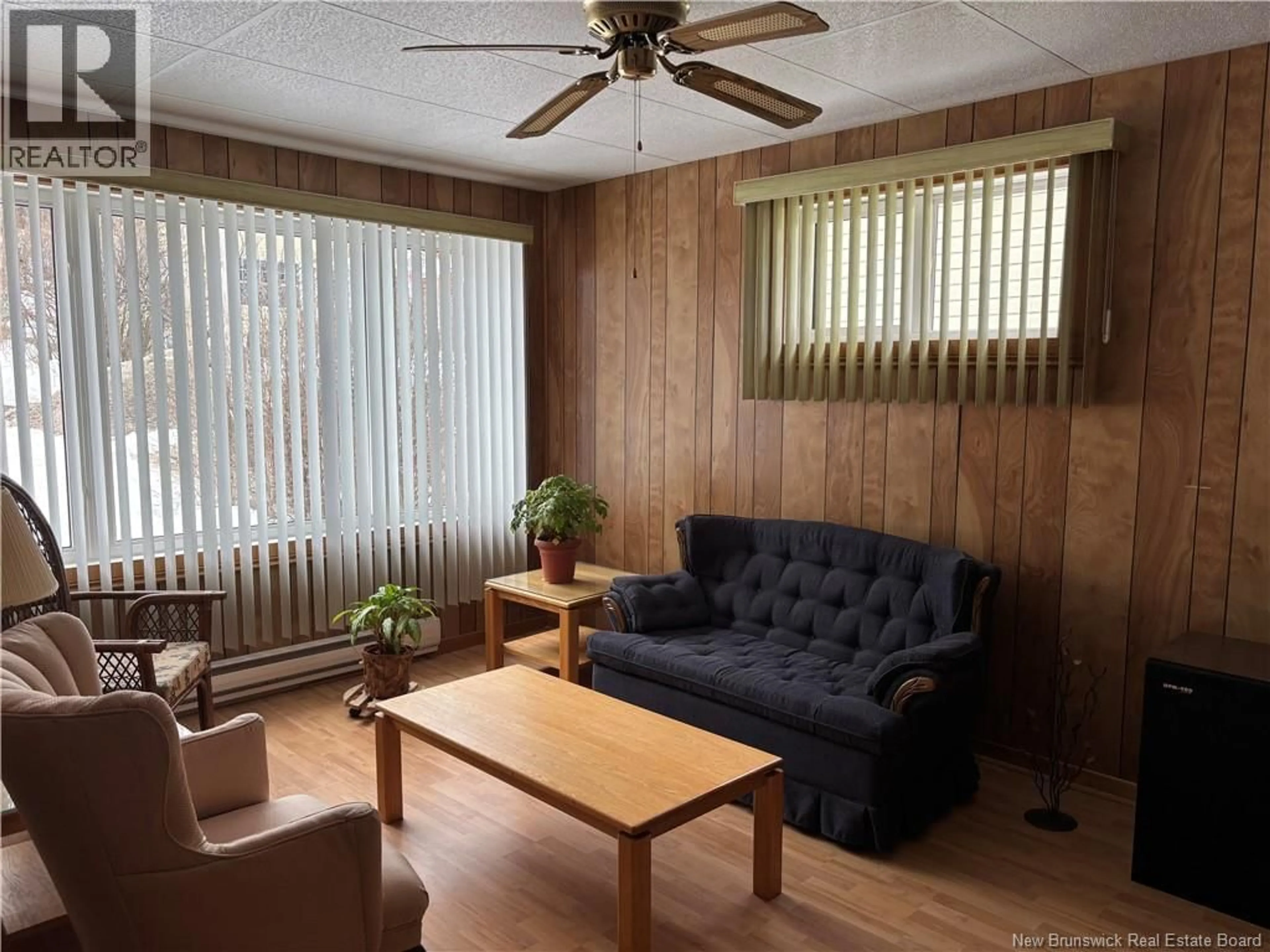 Living room with furniture, wood/laminate floor for 349 PRINCESS DRIVE, Bathurst New Brunswick E2A2R6