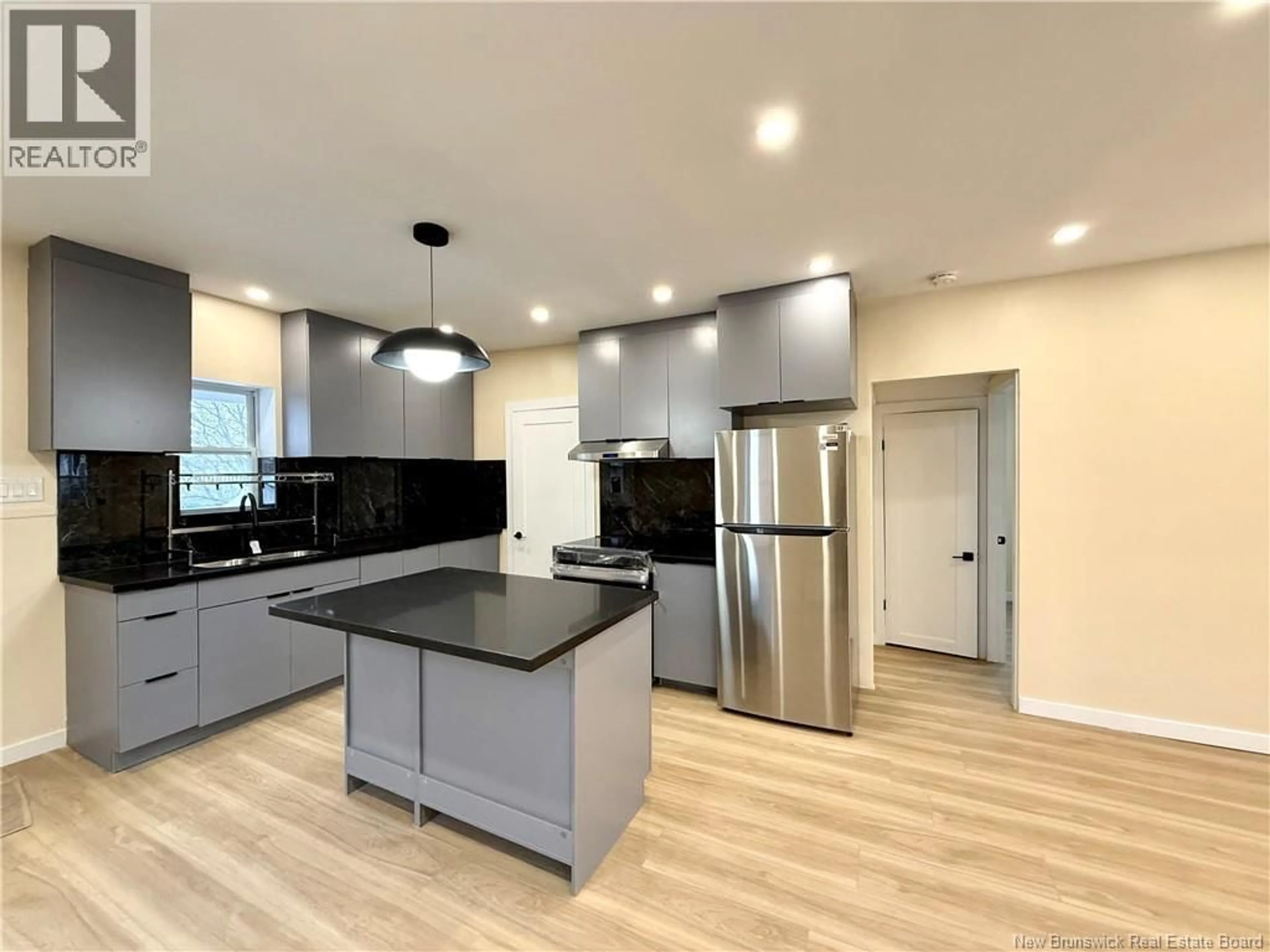 Open concept kitchen, unknown for 16 RUE BELLEVUE STREET, Edmundston New Brunswick E3V2C7