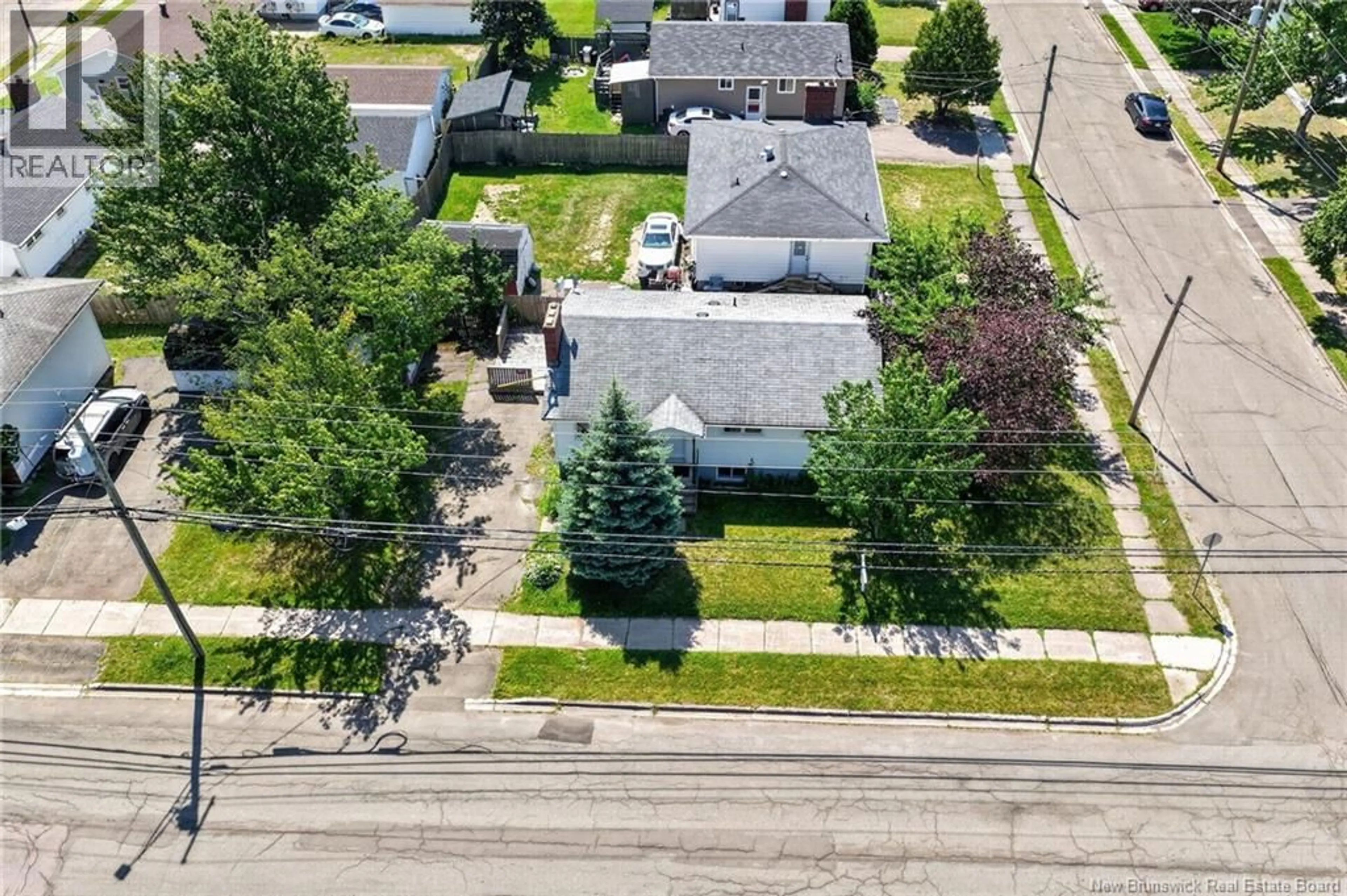 A pic from outside/outdoor area/front of a property/back of a property/a pic from drone, street for 142 CRANDALL, Moncton New Brunswick E1C4E3