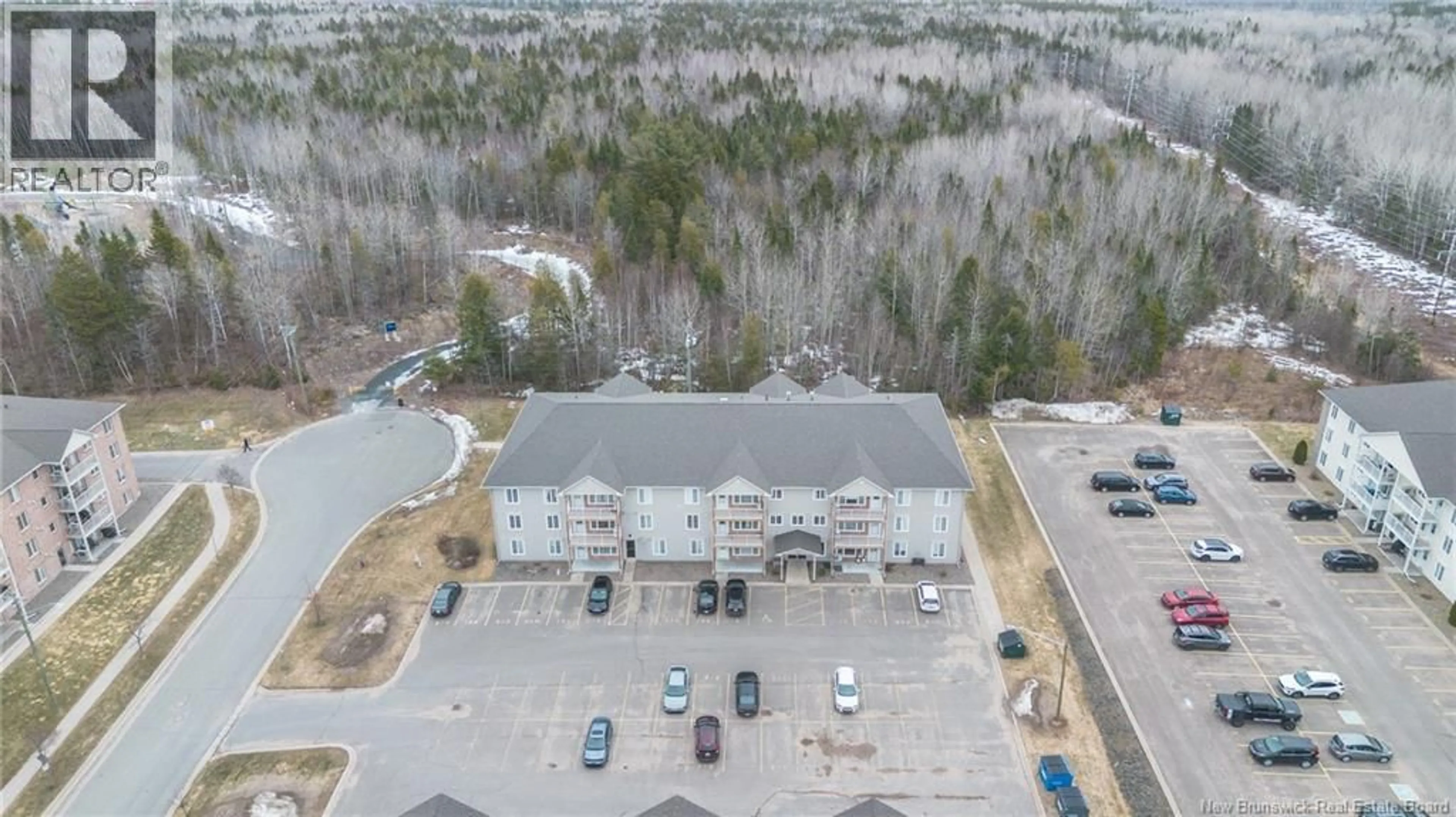 A pic from outside/outdoor area/front of a property/back of a property/a pic from drone, building for 105 - 170 VALCOUR DRIVE, Fredericton New Brunswick E3C0C9