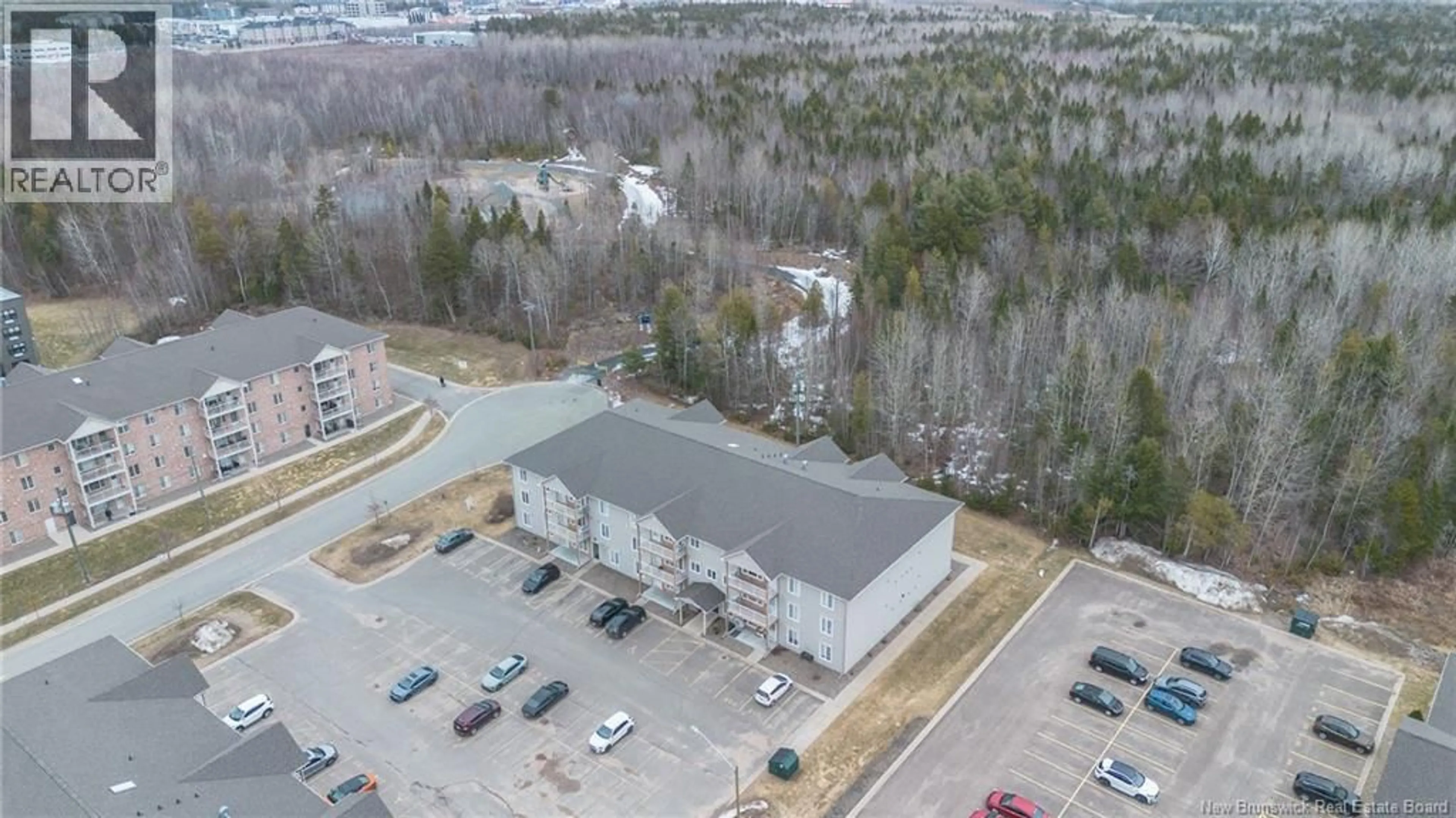A pic from outside/outdoor area/front of a property/back of a property/a pic from drone, building for 105 - 170 VALCOUR DRIVE, Fredericton New Brunswick E3C0C9