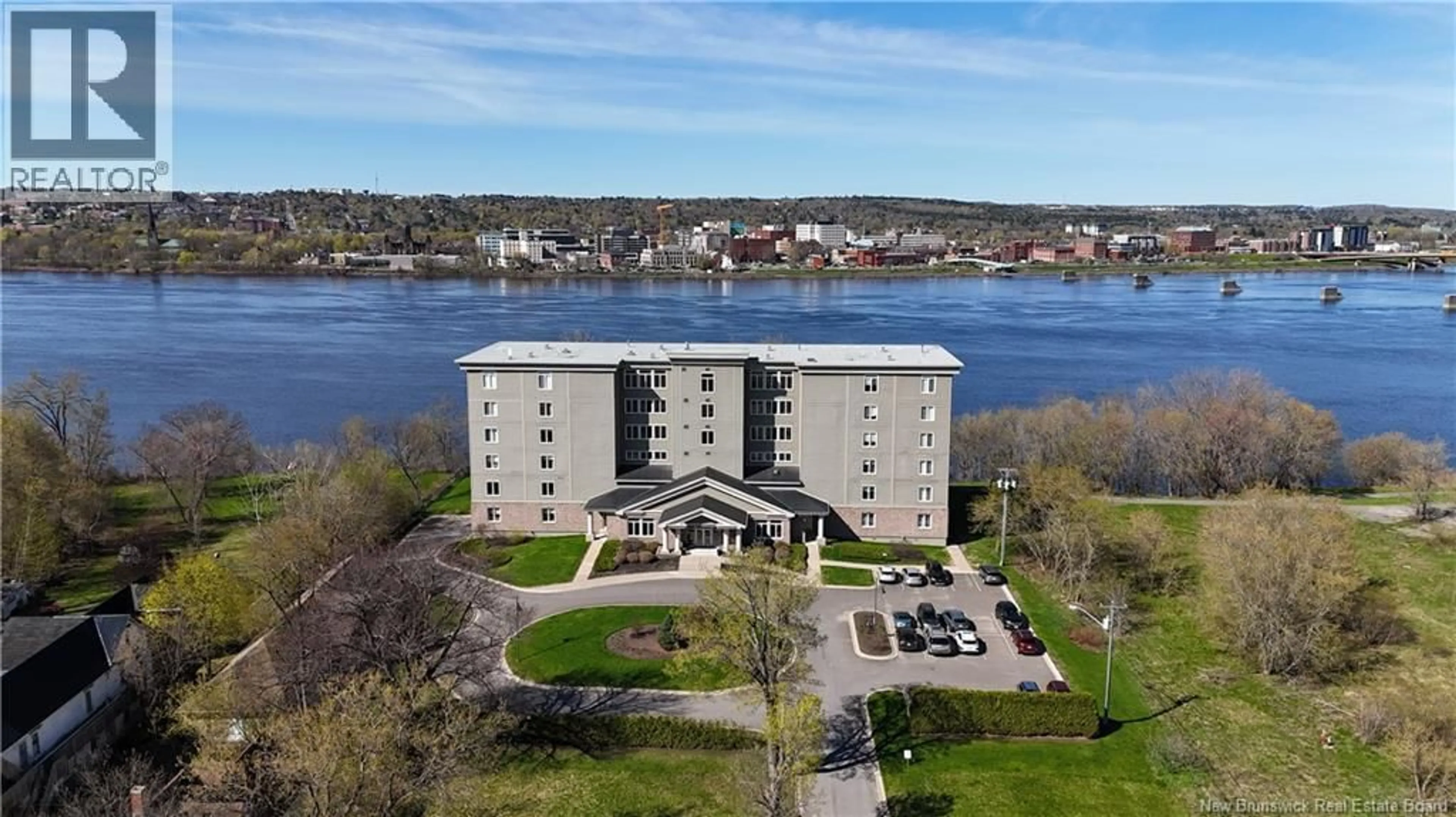 A pic from outside/outdoor area/front of a property/back of a property/a pic from drone, water/lake/river/ocean view for 104 - 1 SOUTHVIEW LANE, Fredericton New Brunswick E3A5V3