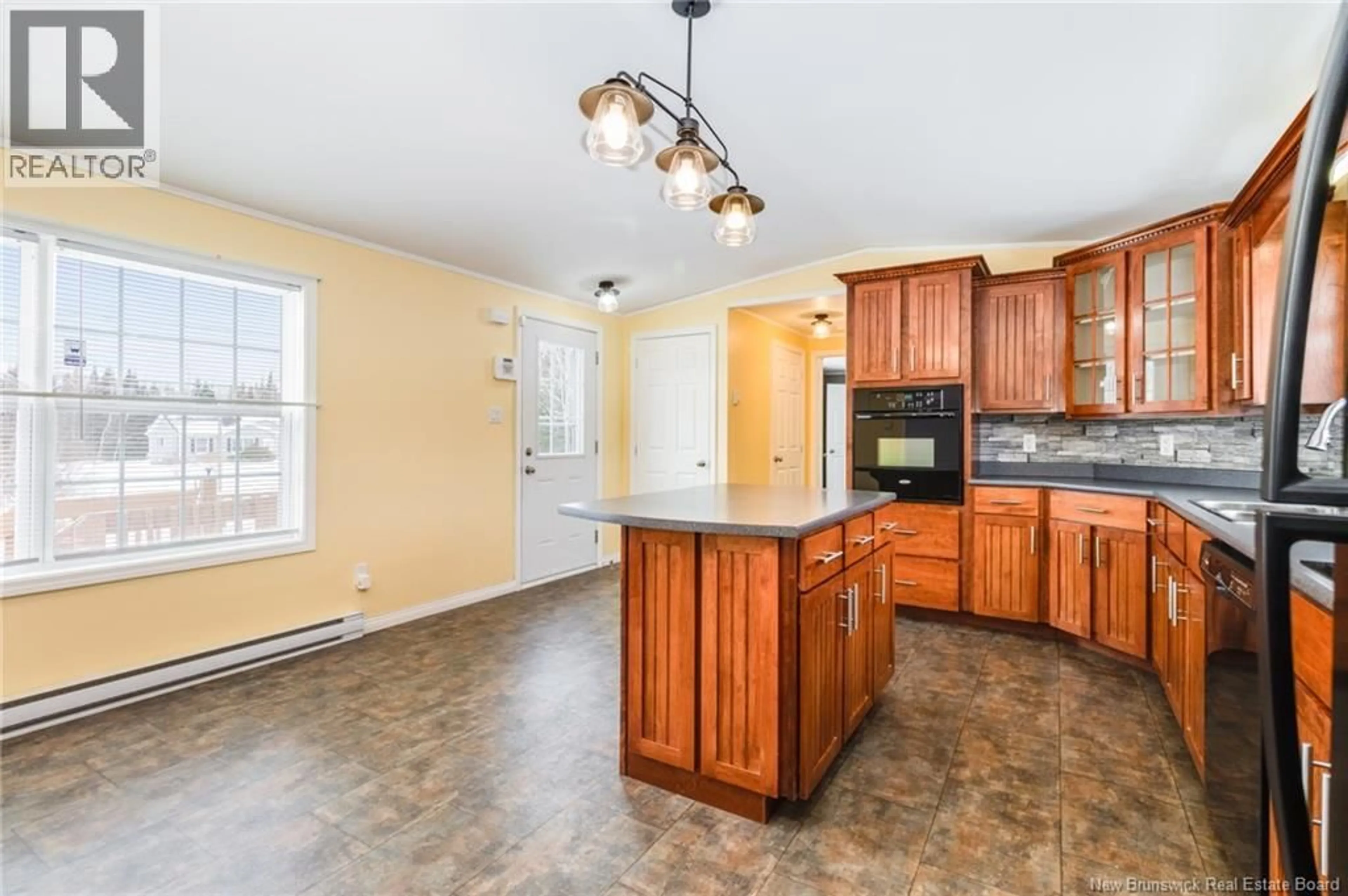 Open concept kitchen, unknown for 23 O'LEARY CRESCENT, Rusagonis New Brunswick E3B0R3