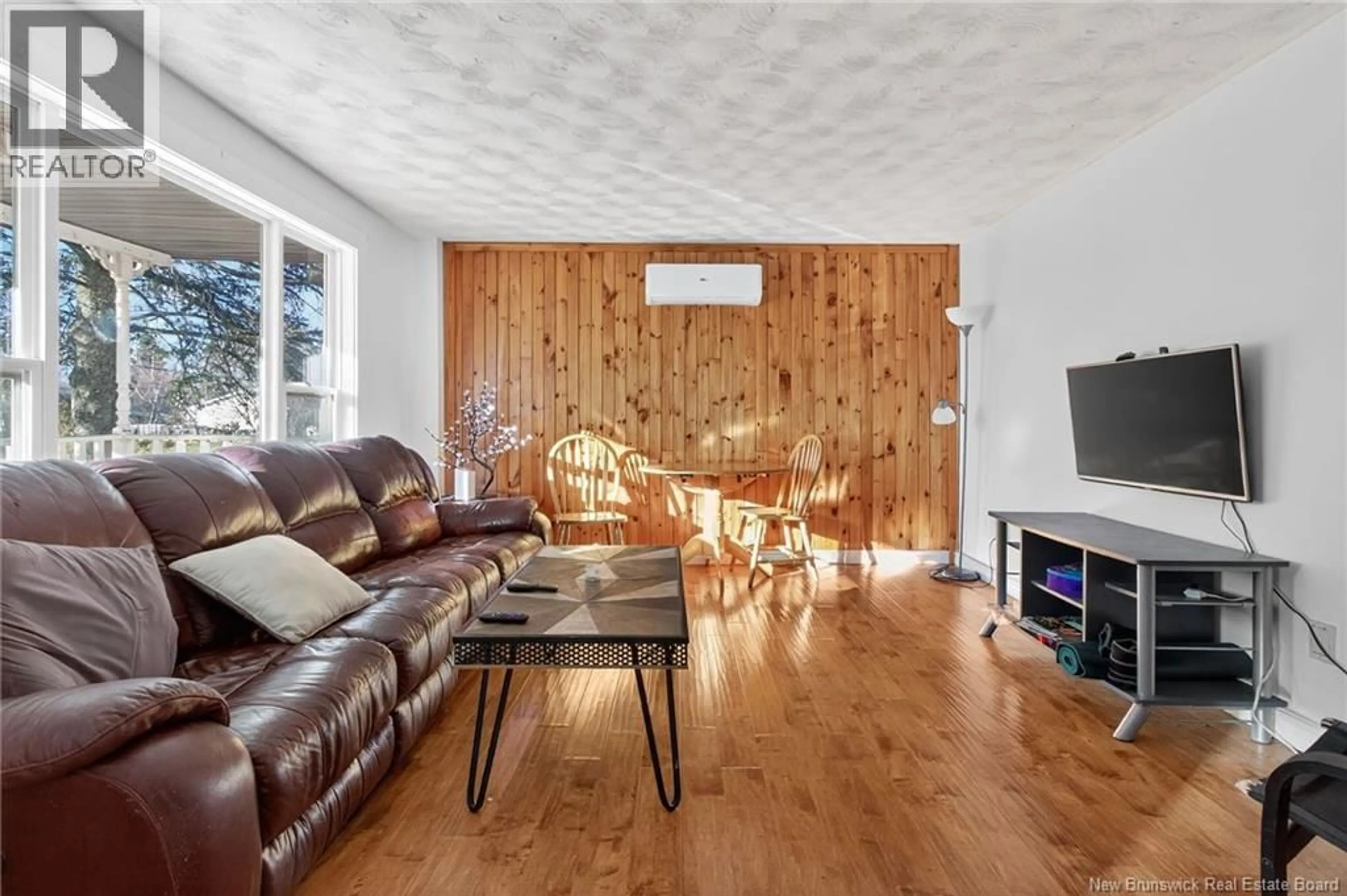 Living room with furniture, wood/laminate floor for 29 SECOND AVENUE, Moncton New Brunswick E1C7X9