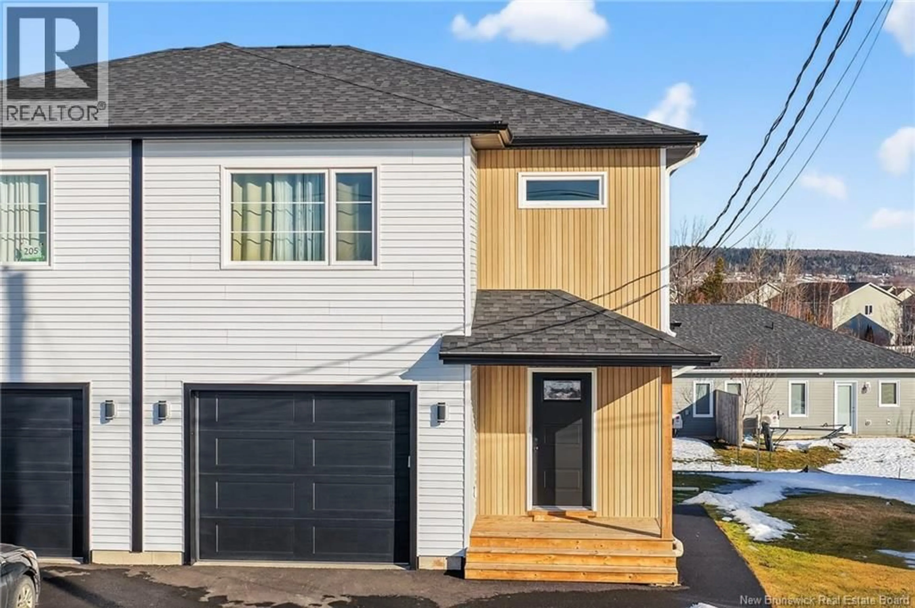 Home with vinyl exterior material, street for 203 TEABERRY AVENUE, Moncton New Brunswick E1G0E8