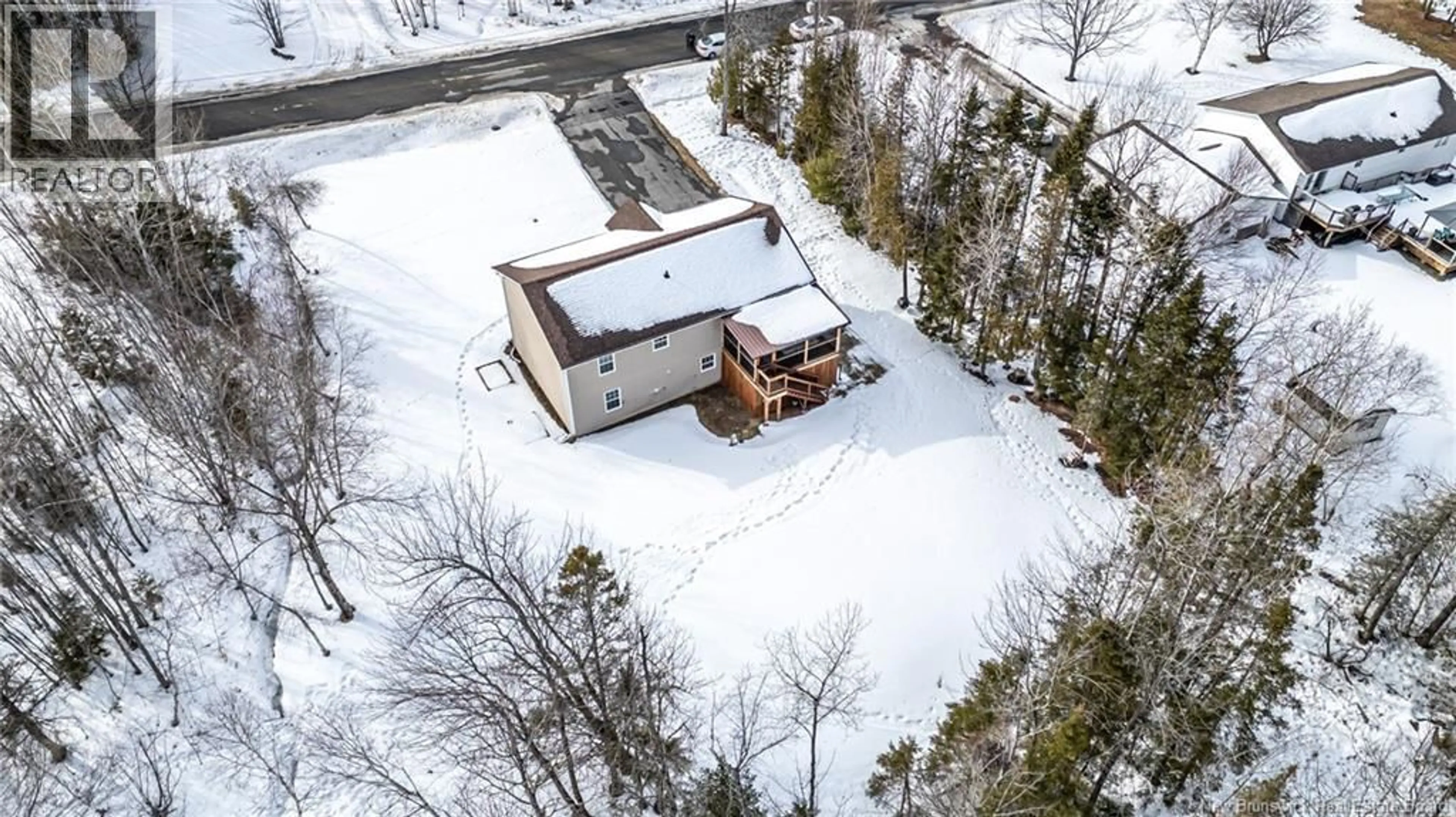 A pic from outside/outdoor area/front of a property/back of a property/a pic from drone, street for 70 BROOKDALE DRIVE, Hanwell New Brunswick E3C1M5