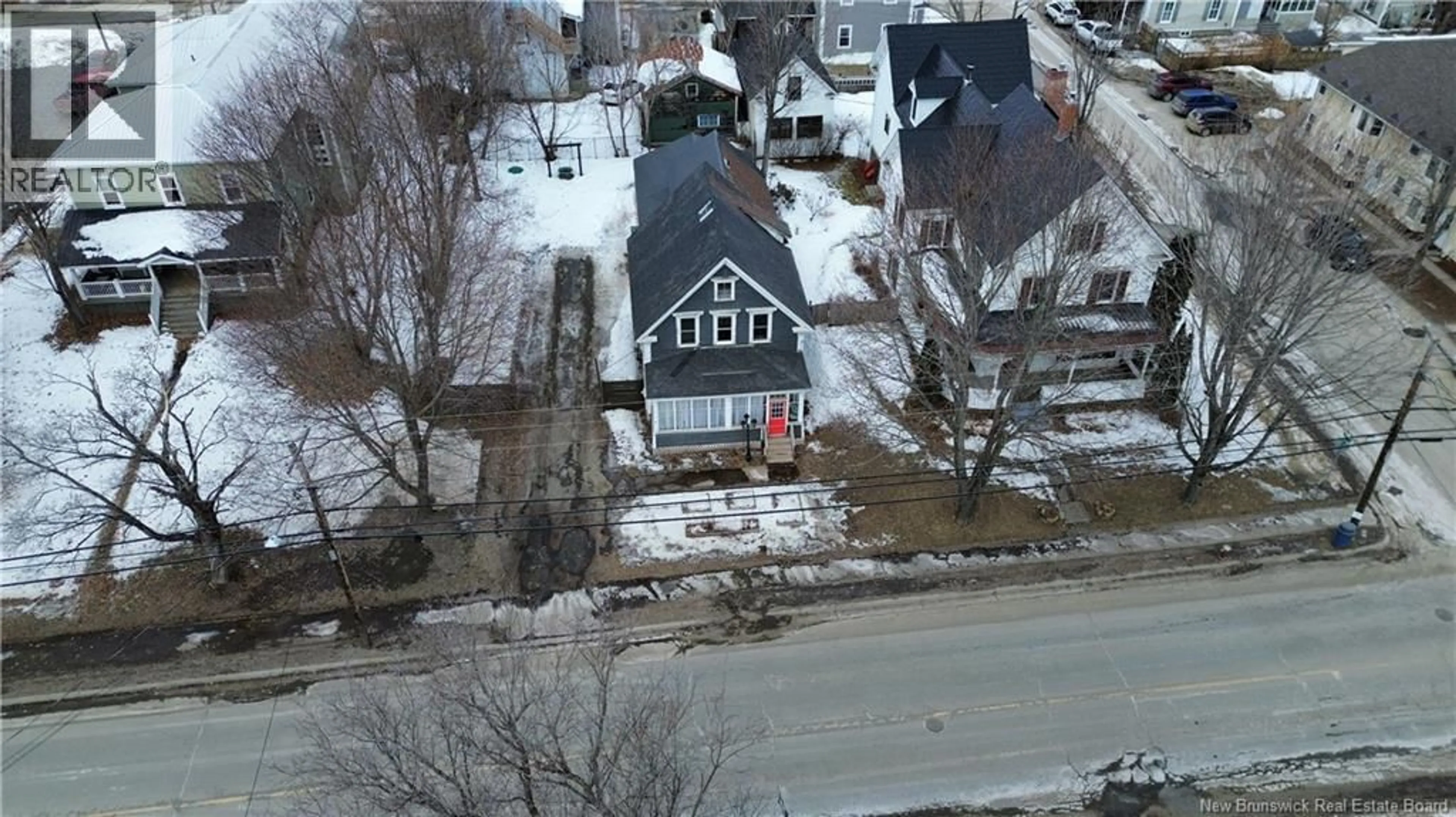 A pic from outside/outdoor area/front of a property/back of a property/a pic from drone, street for 126 BROADWAY STREET, Woodstock New Brunswick E7M1C2