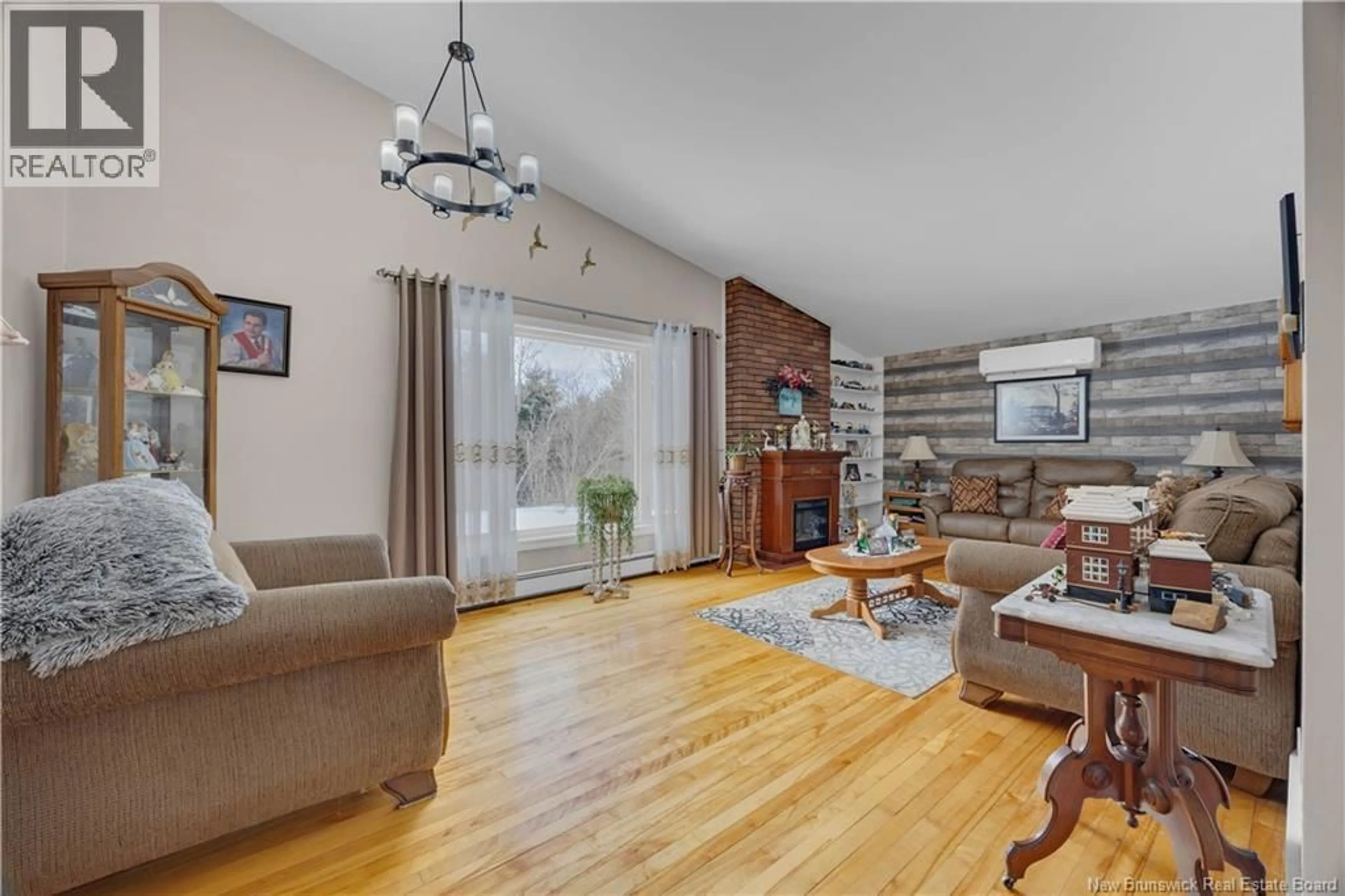 Living room with furniture, wood/laminate floor for 50 CREIGHTON AVENUE, Saint John New Brunswick E2J3G7