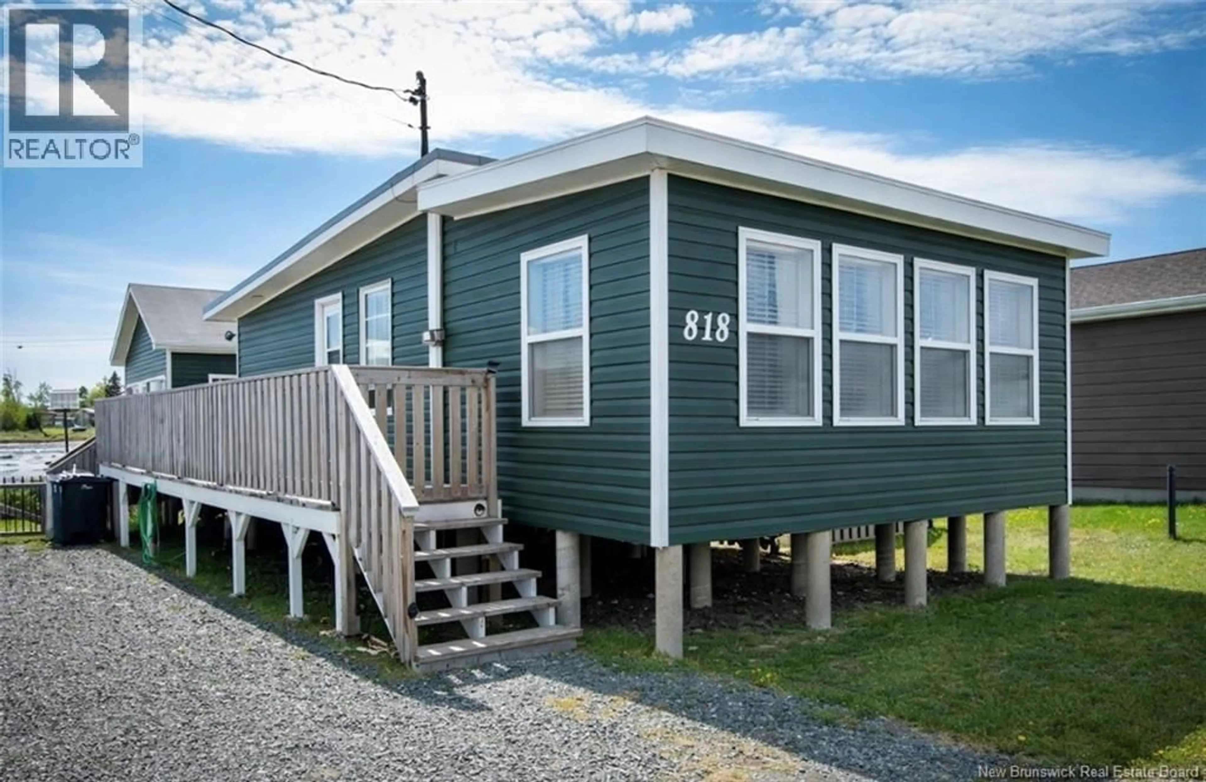 Home with vinyl exterior material, unknown for 818 JOHN CORMIER, Beresford New Brunswick E8K1W1