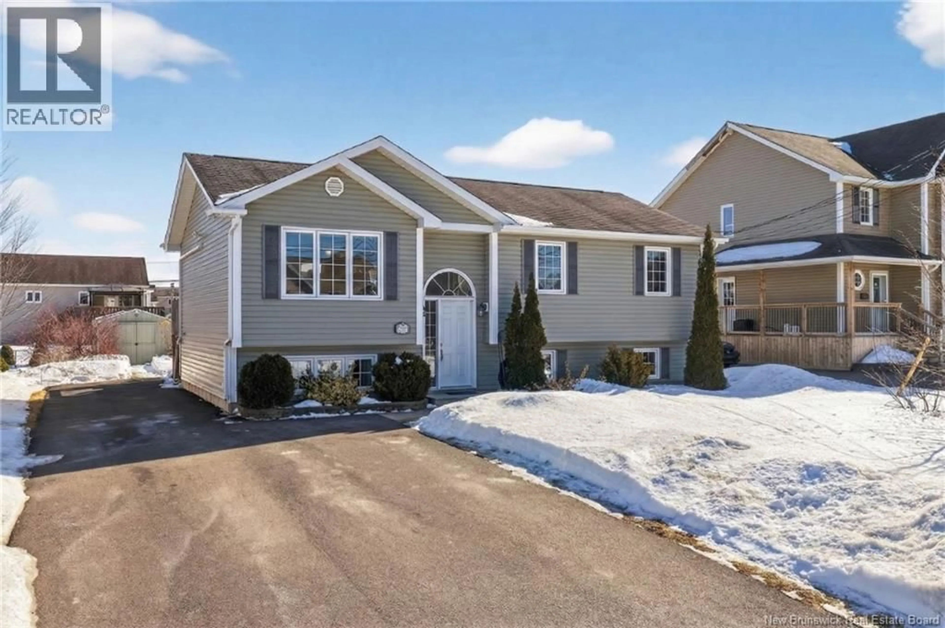 Home with vinyl exterior material, street for 94 FALCON, Moncton New Brunswick E1G0H7